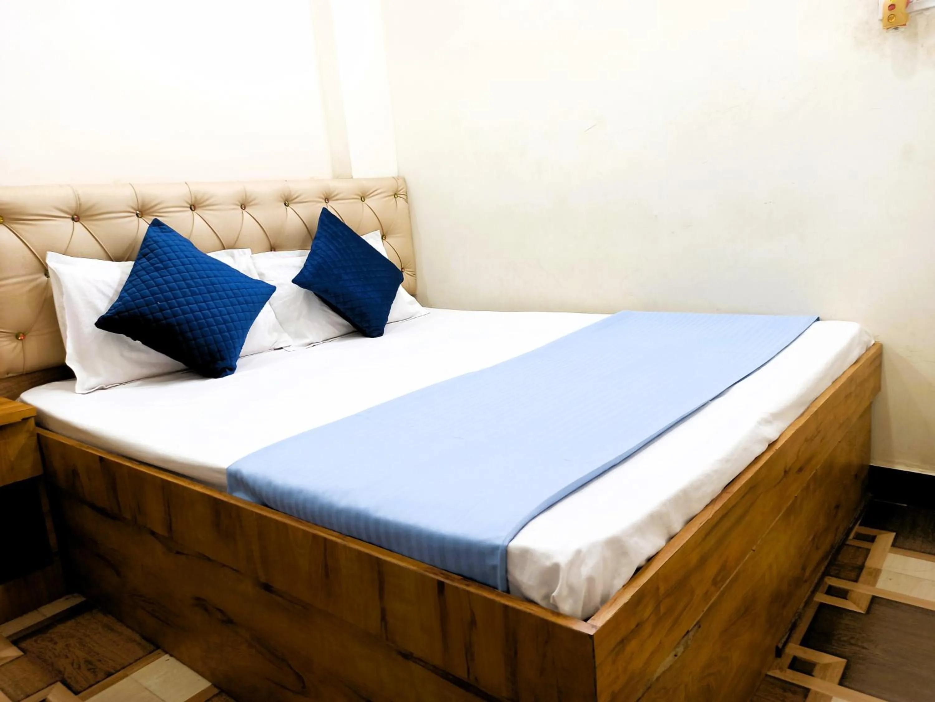 Bed in Hotel Yuvan Palace