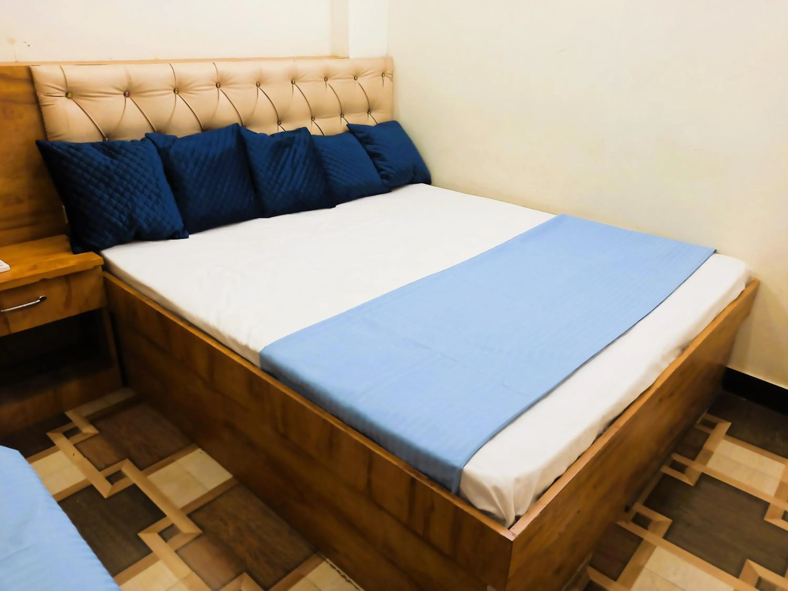 Bed in Hotel Yuvan Palace