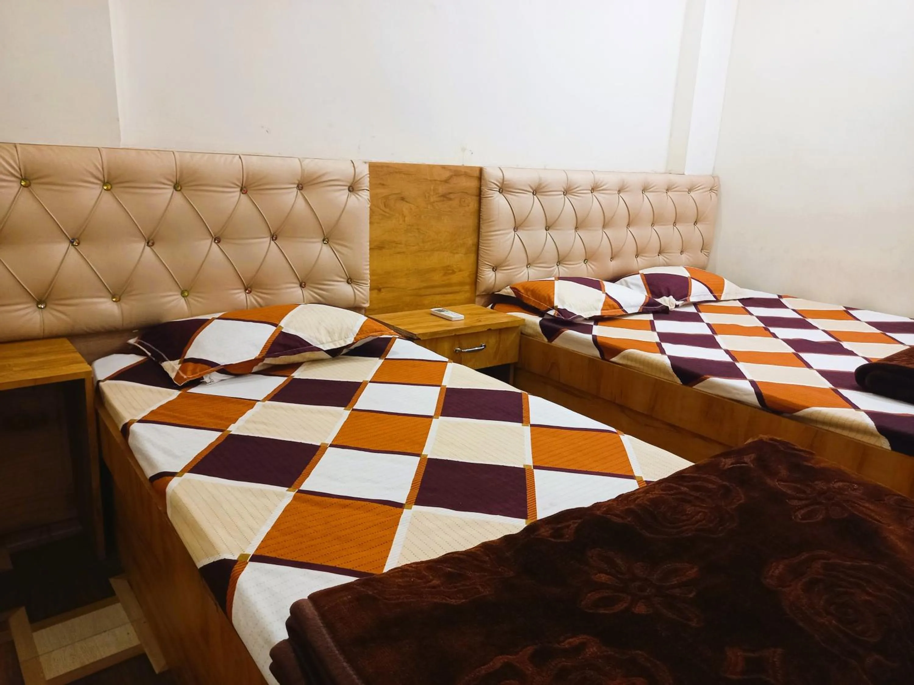 Bed in Hotel Yuvan Palace