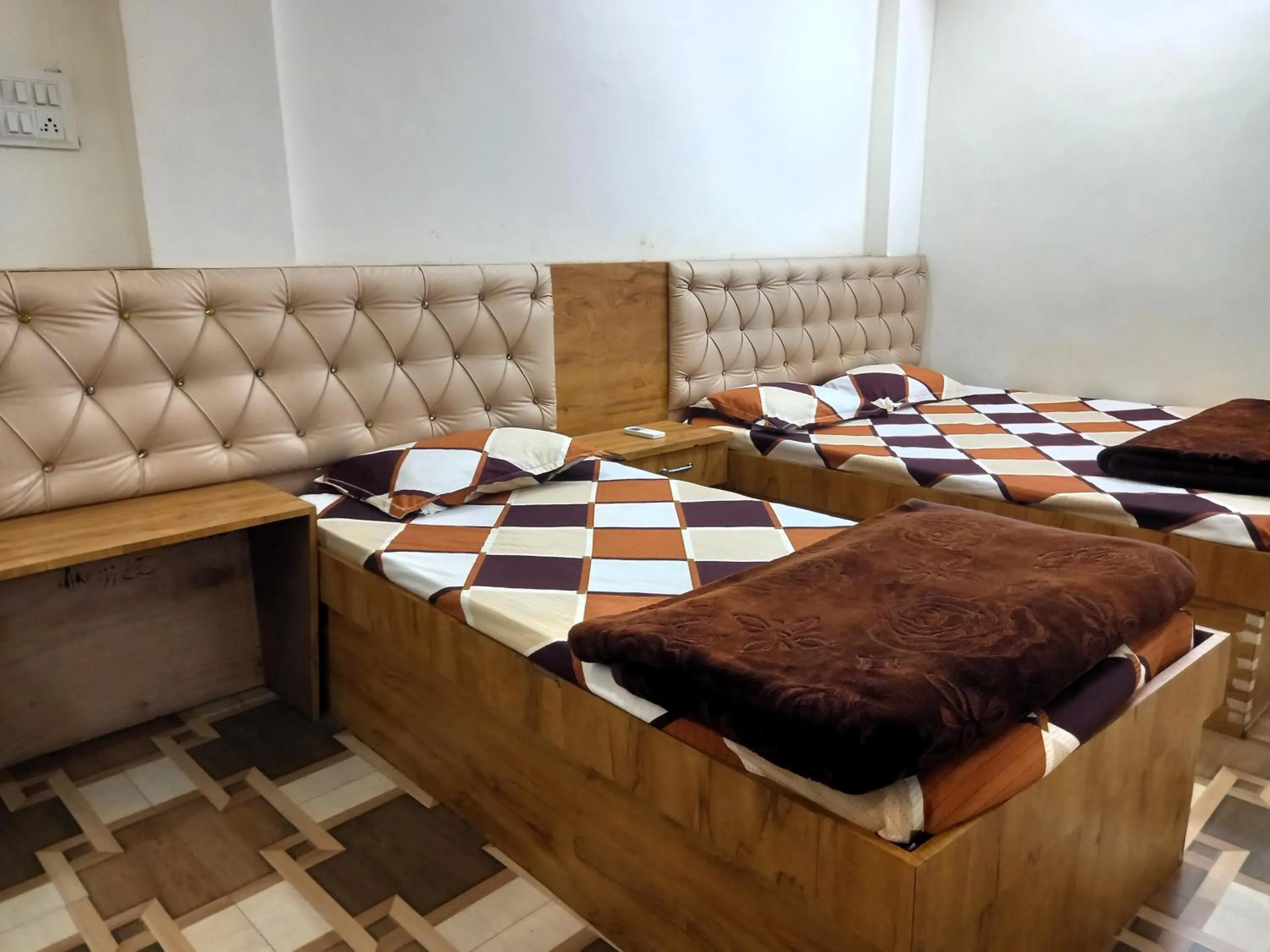 Bed in Hotel Yuvan Palace