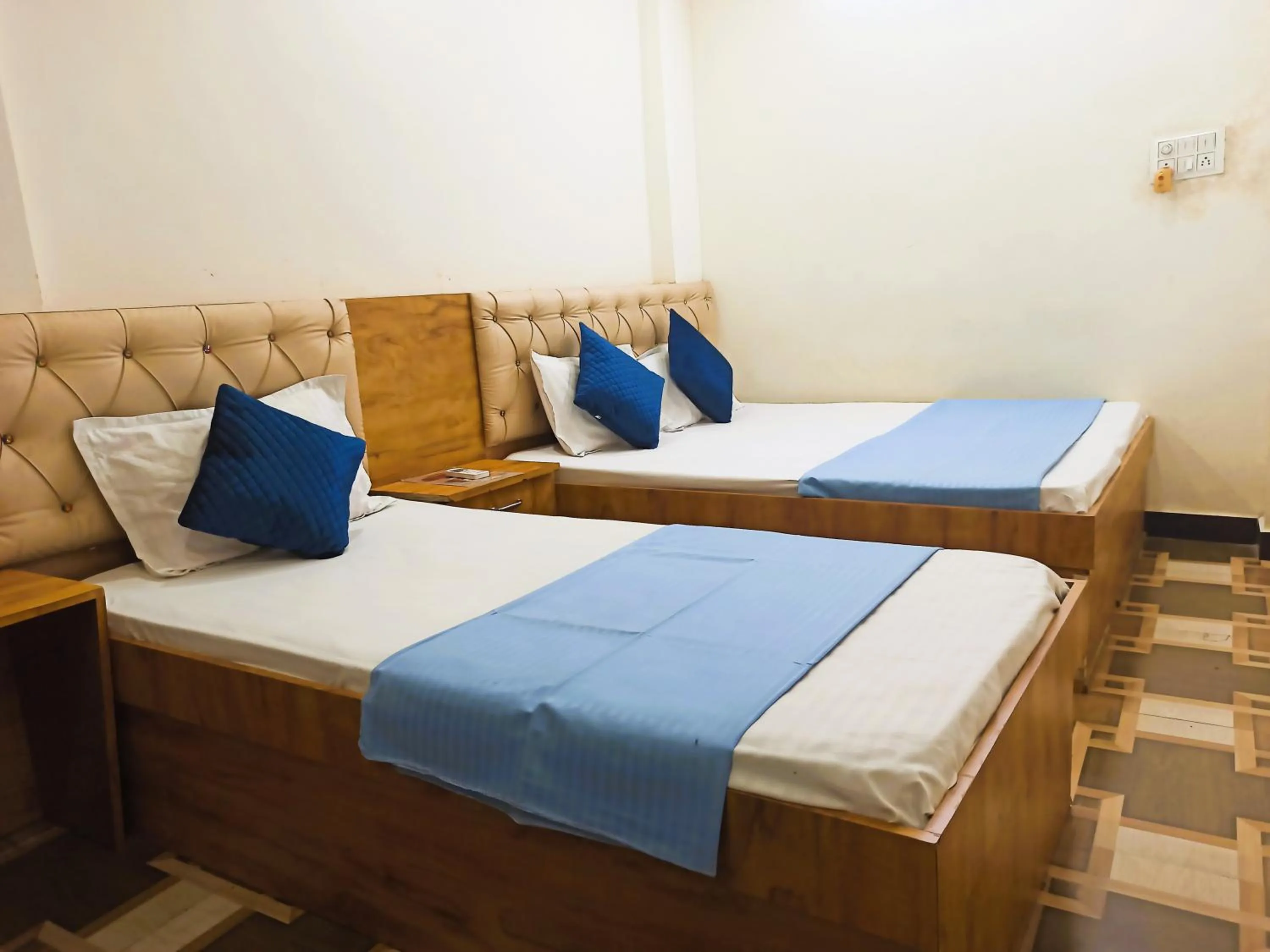 Bed in Hotel Yuvan Palace