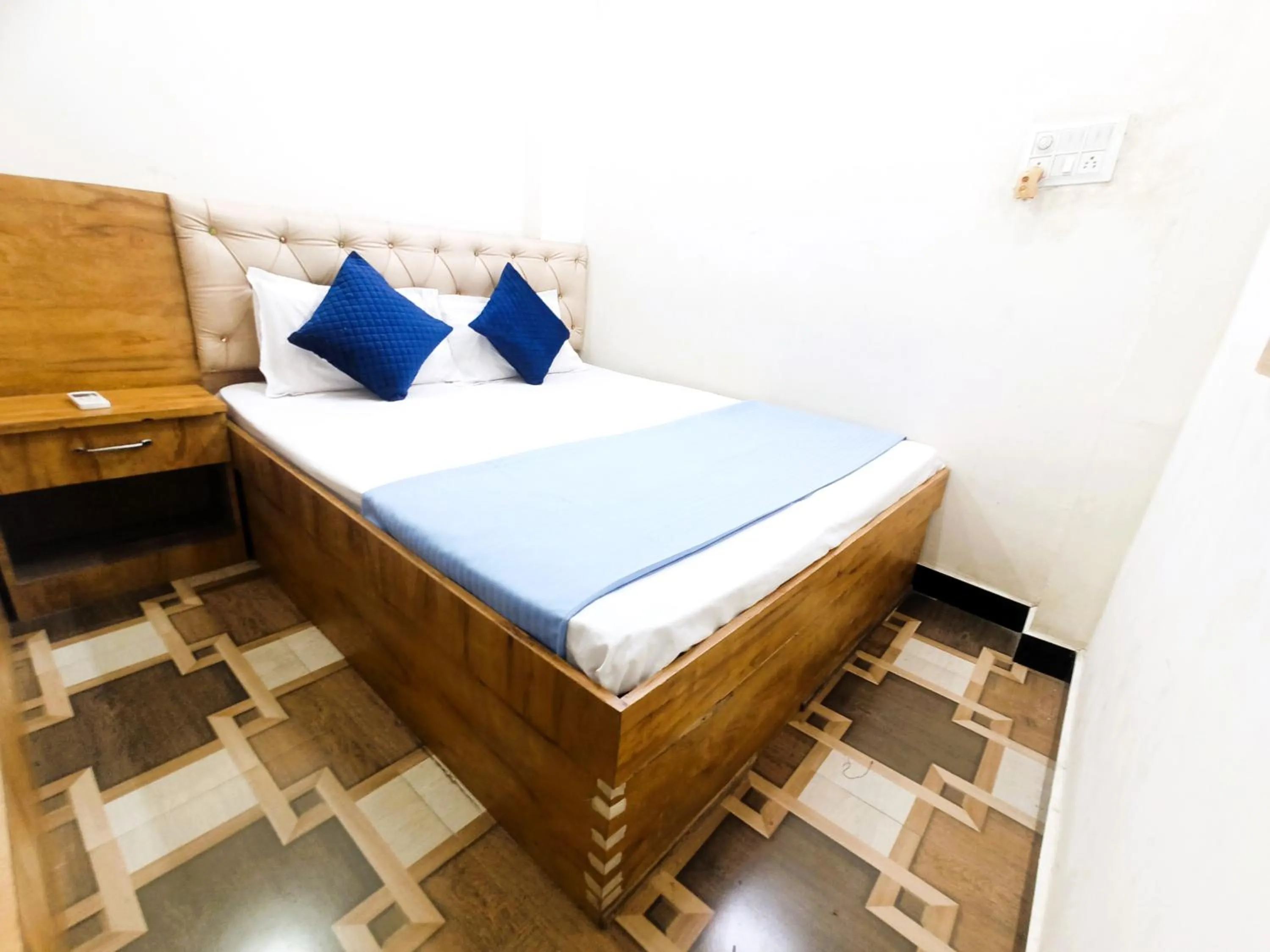 Bed in Hotel Yuvan Palace