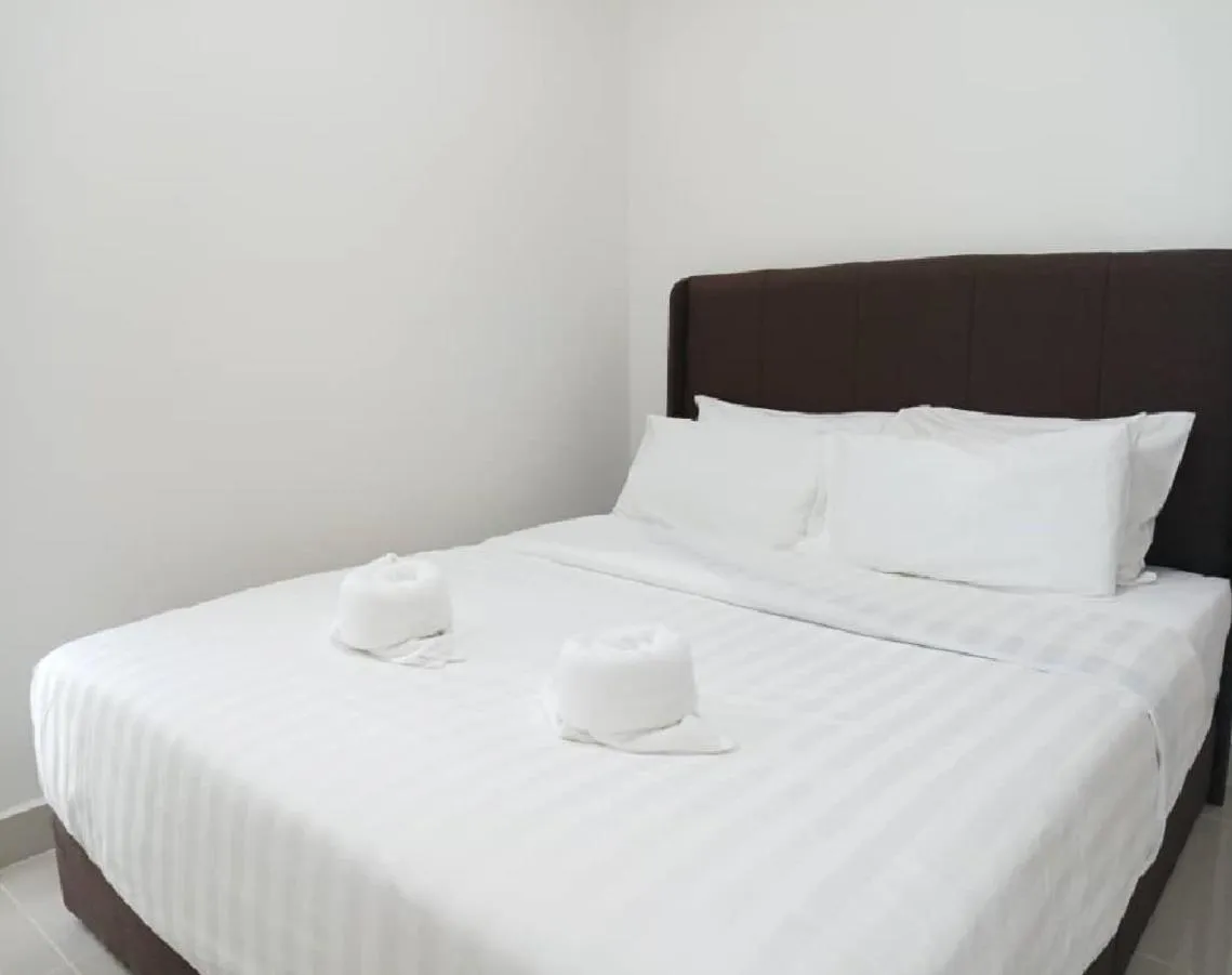 Bed in Beautiful Seaview Suites at The Shore Kota Kinabalu