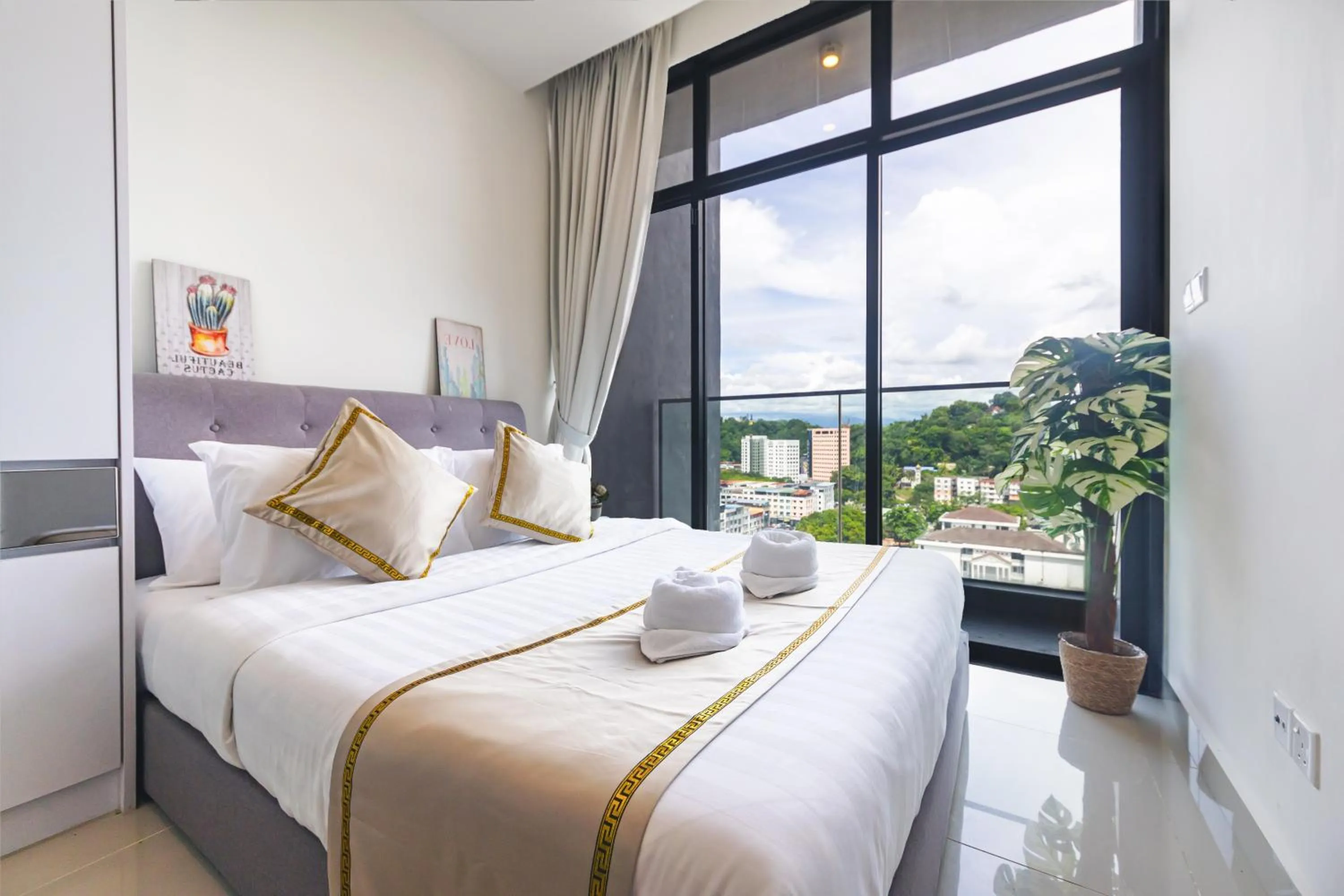 Bed in Beautiful Seaview Suites at The Shore Kota Kinabalu