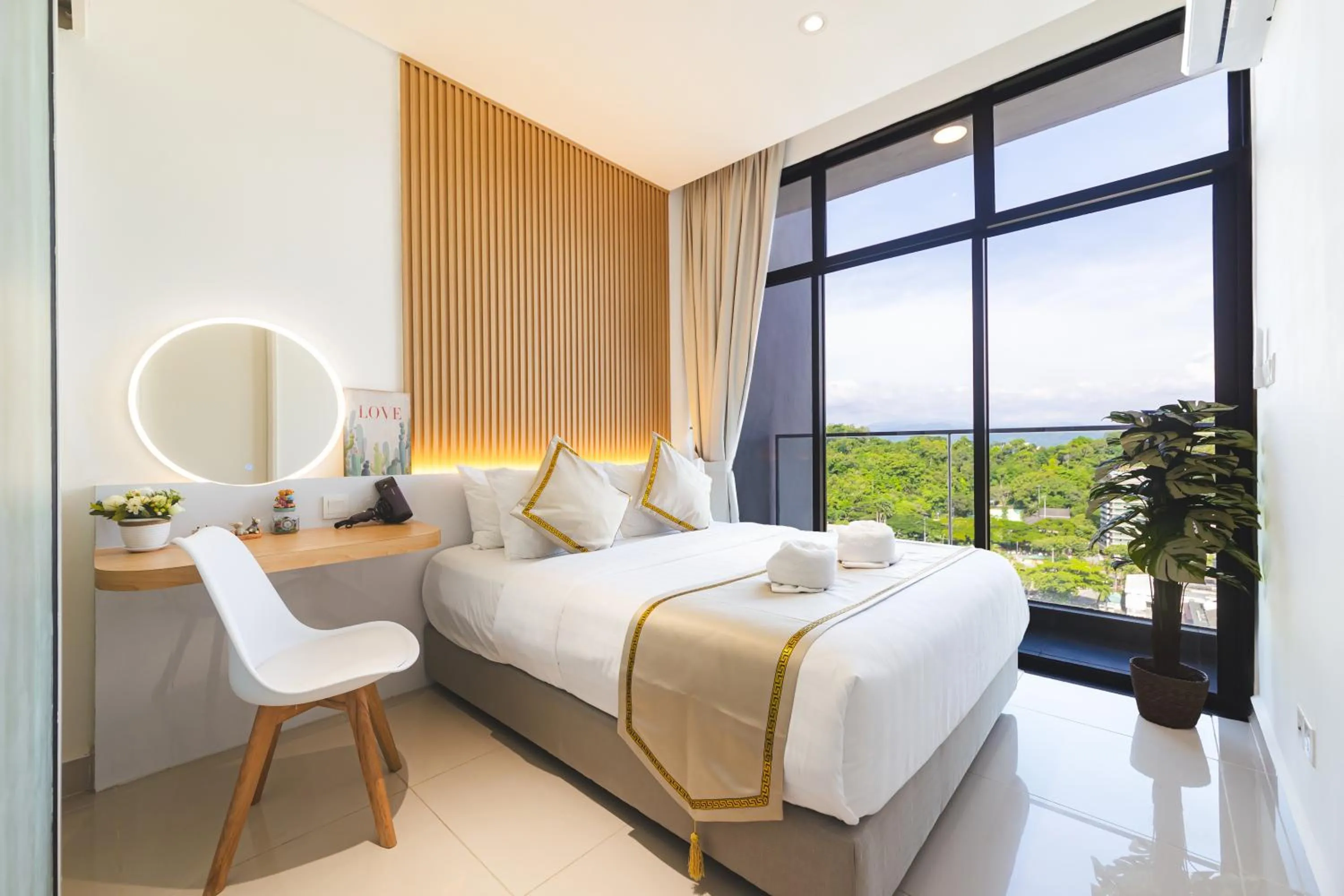 Bed in Beautiful Seaview Suites at The Shore Kota Kinabalu