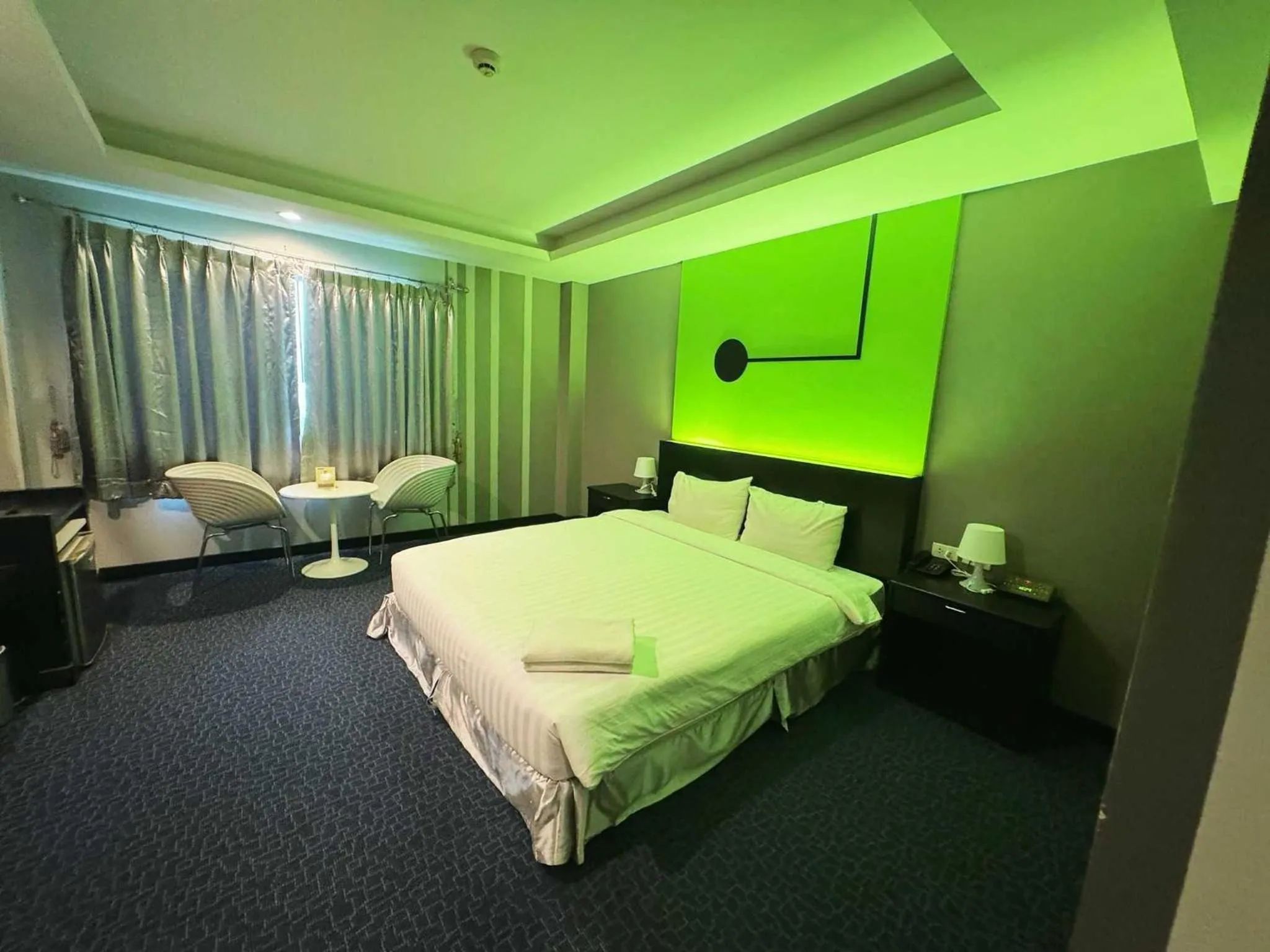 Bedroom in Capital O 75514 Vasidtee City Hotel (Suphanburi)
