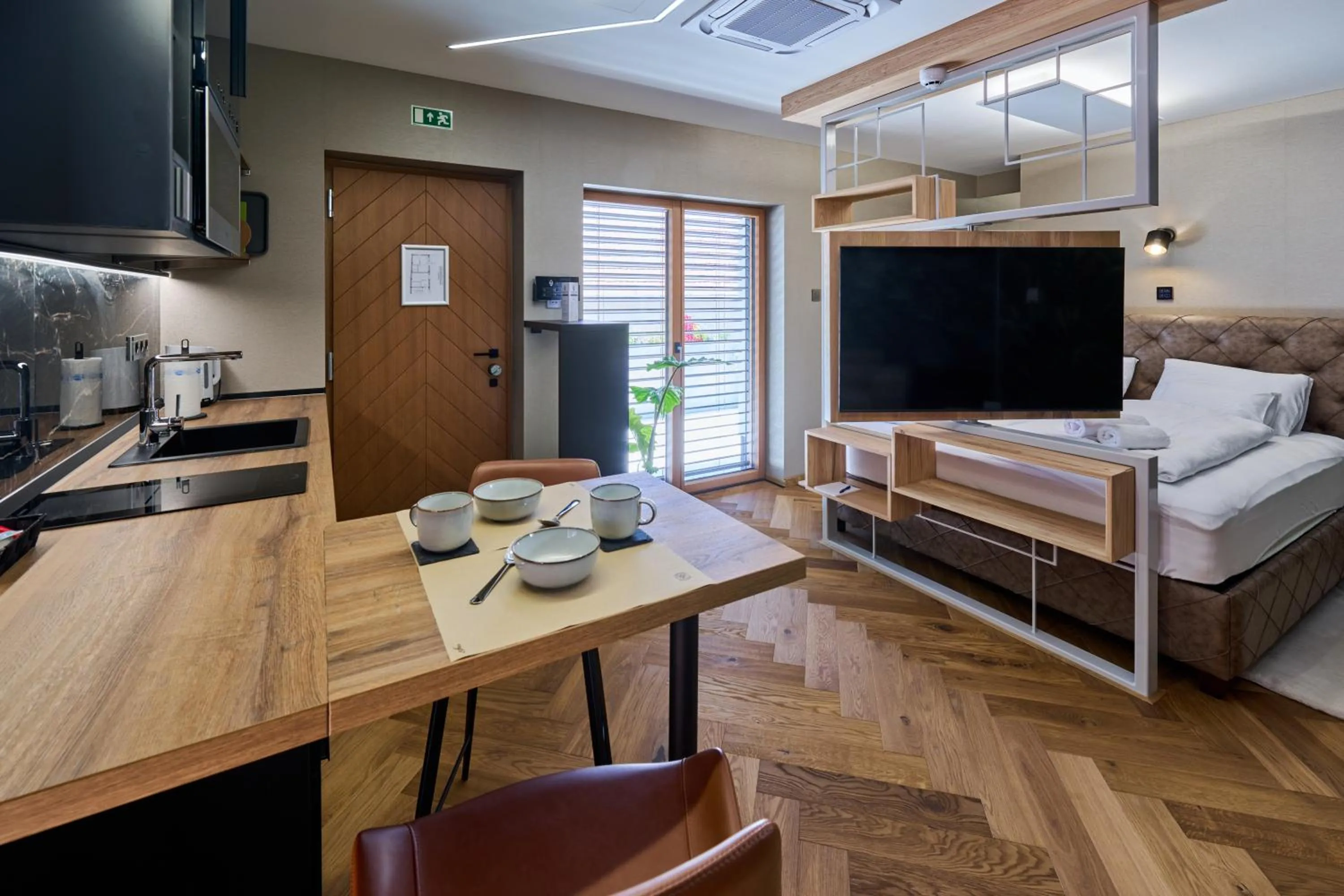 Living room, Bed in GRANDIS Premium Apartments