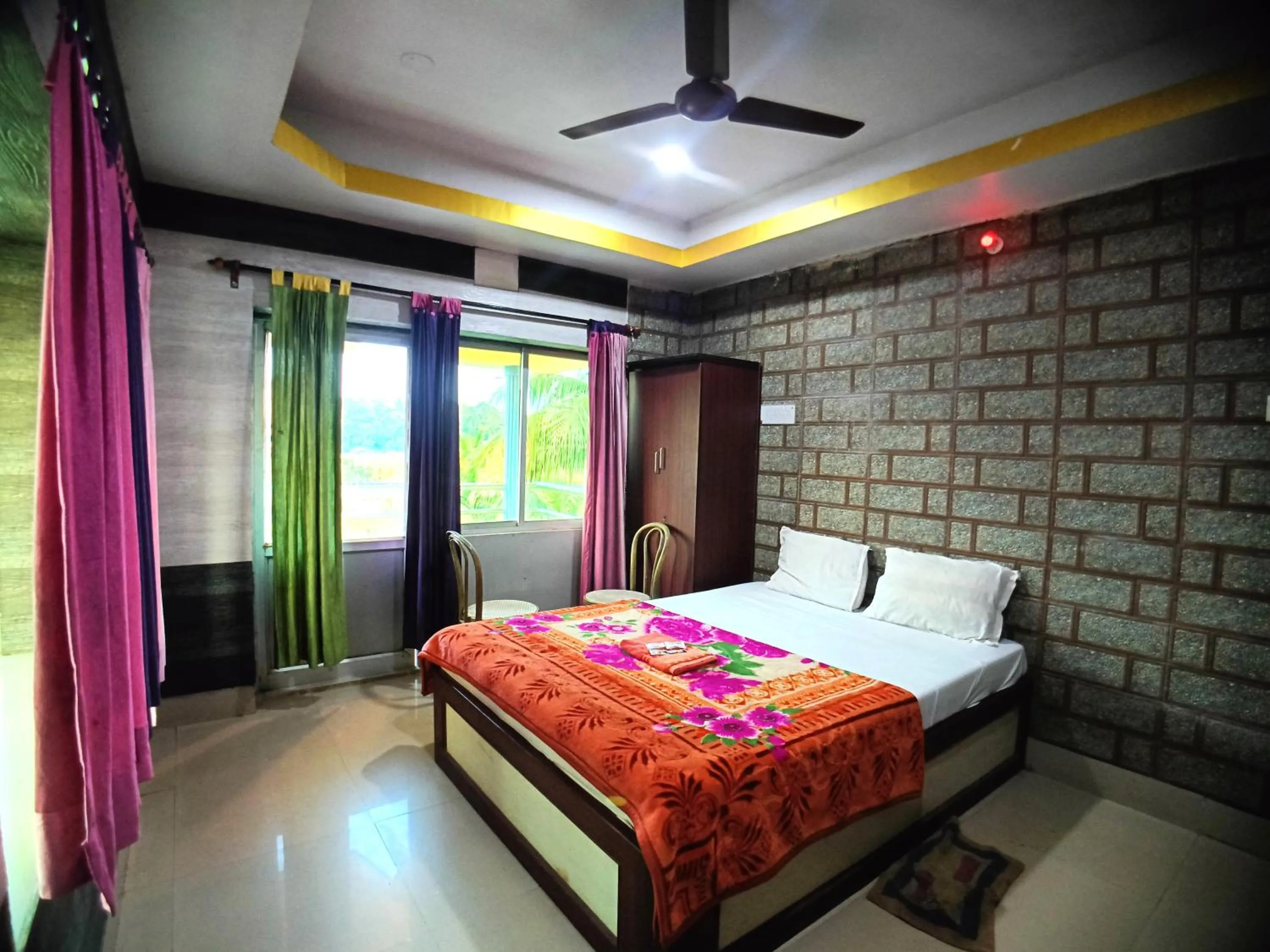 Bed in RESORT K SEA VIEW Digha