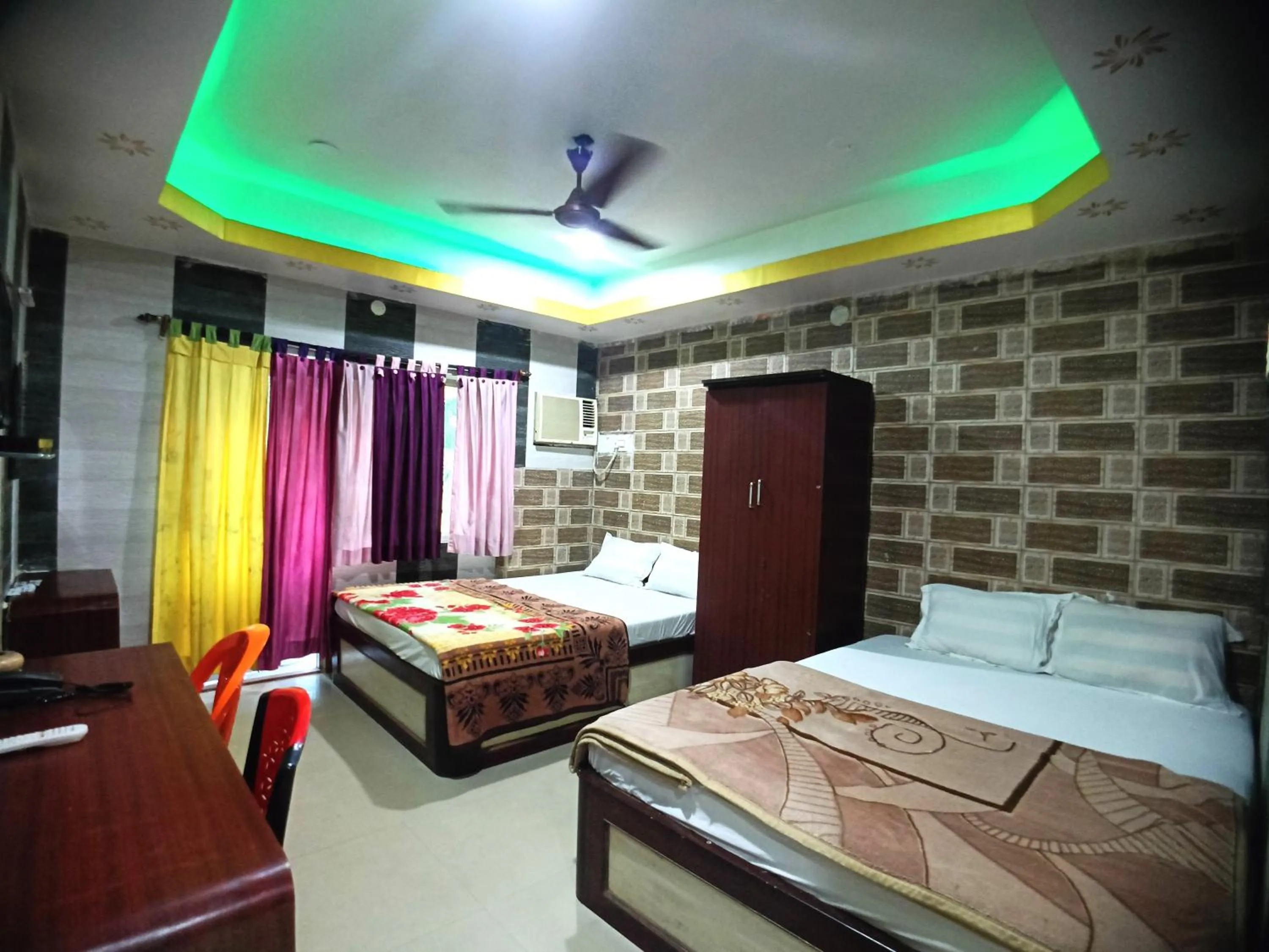 Bed in RESORT K SEA VIEW Digha