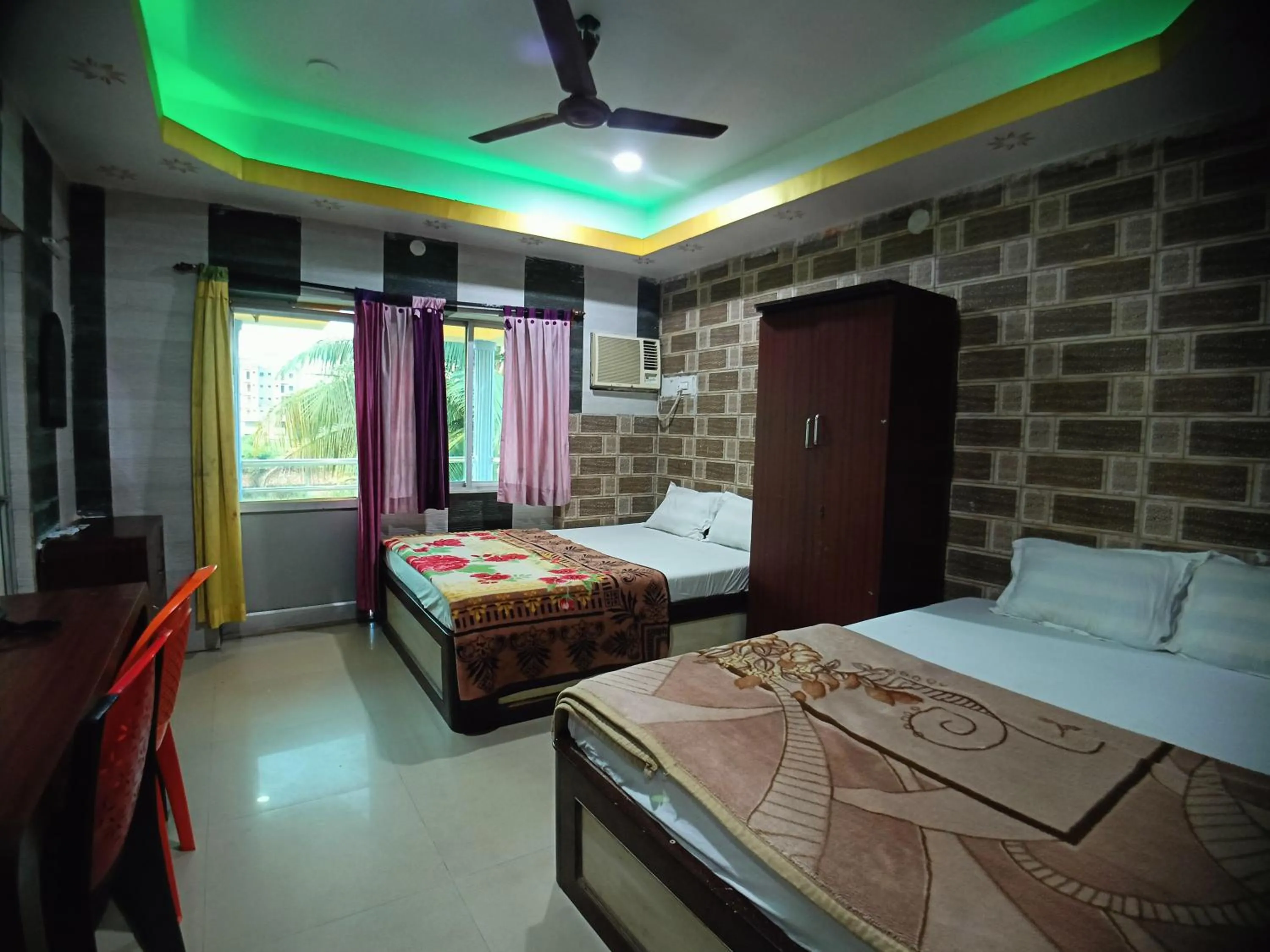 Bed in RESORT K SEA VIEW Digha