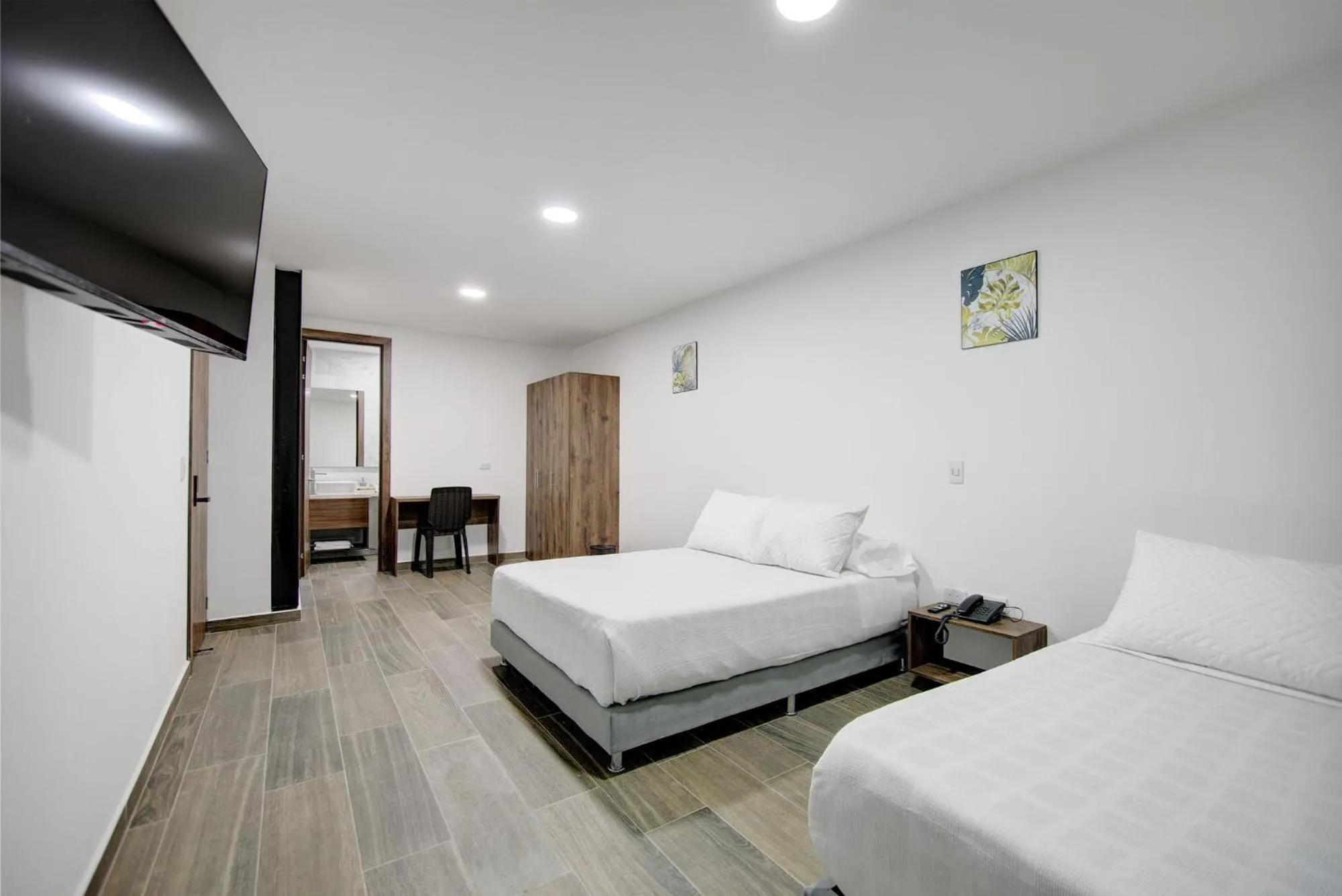 Bed in Xliving Host and Rooms