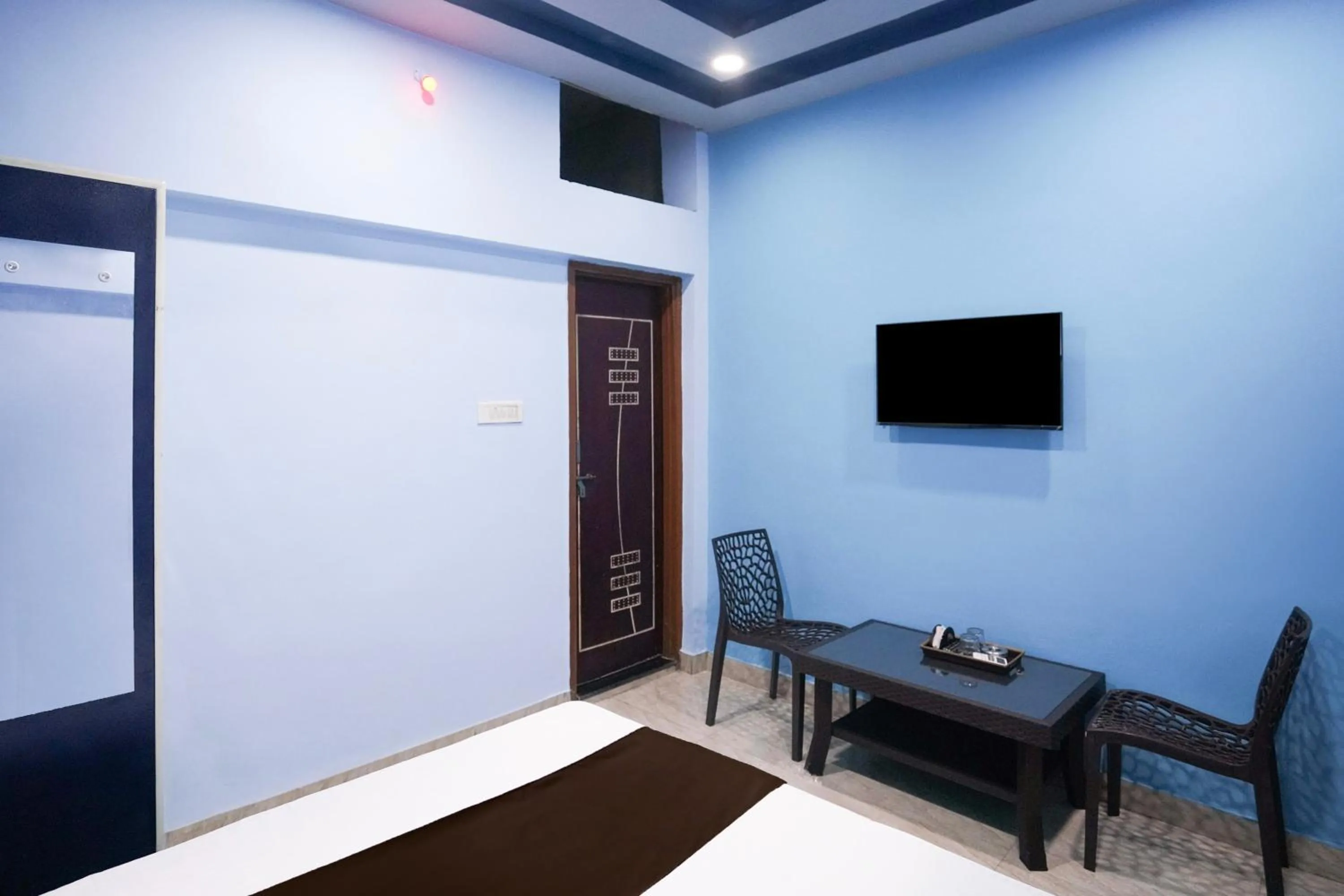 Bedroom in Hotel O Happy Hotel