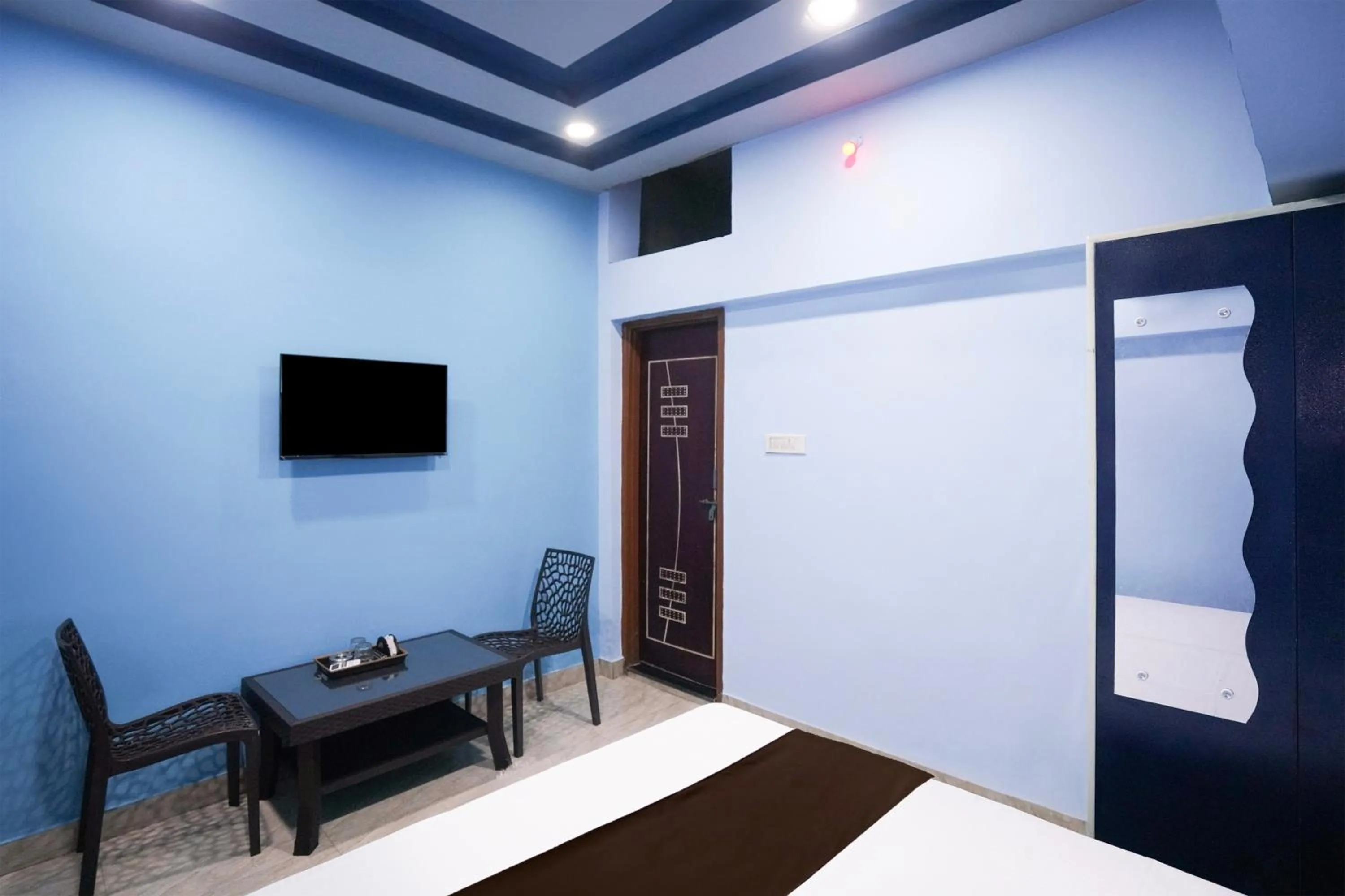 Bedroom in Hotel O Happy Hotel