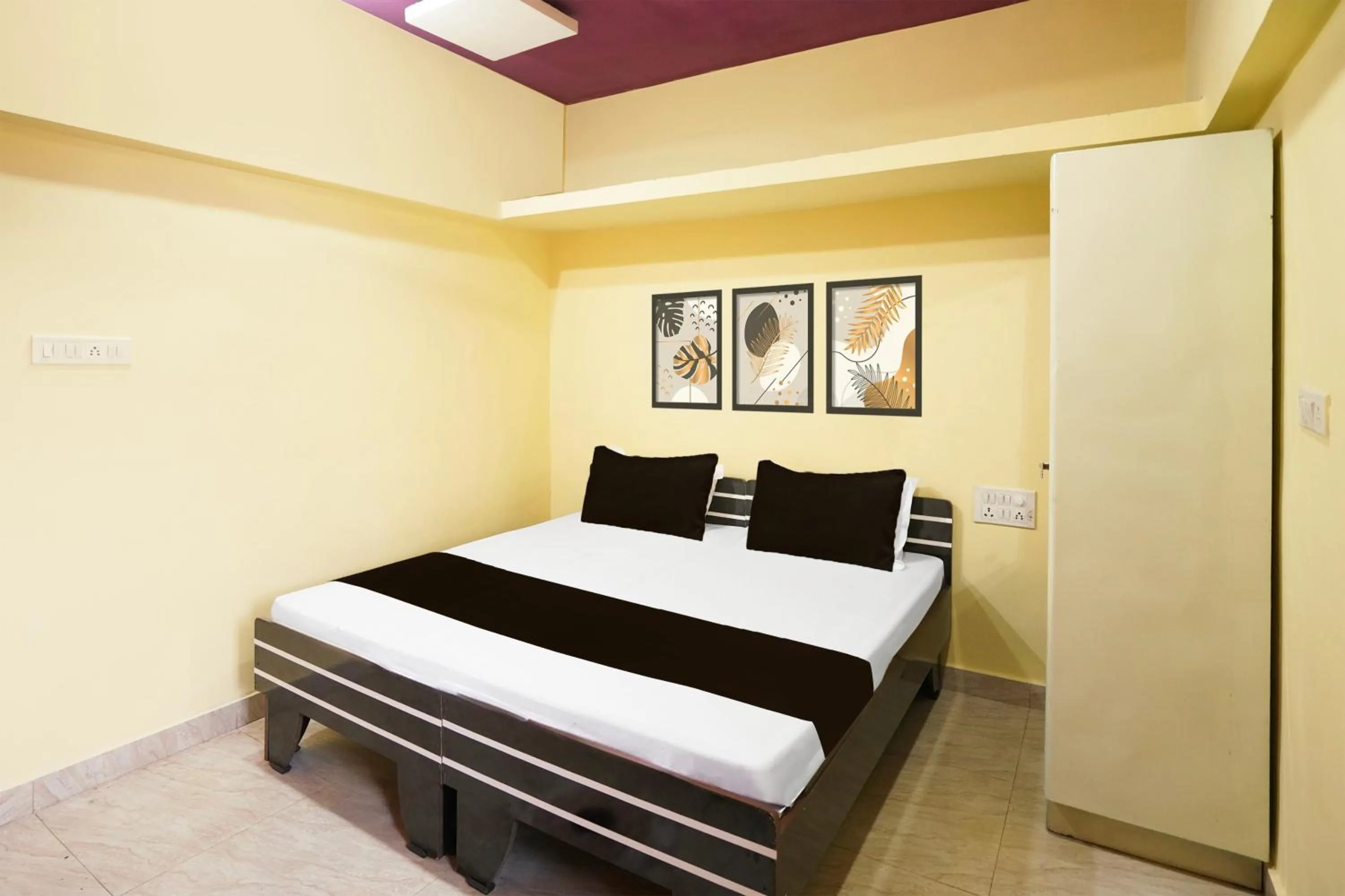 Bedroom in Hotel O Happy Hotel