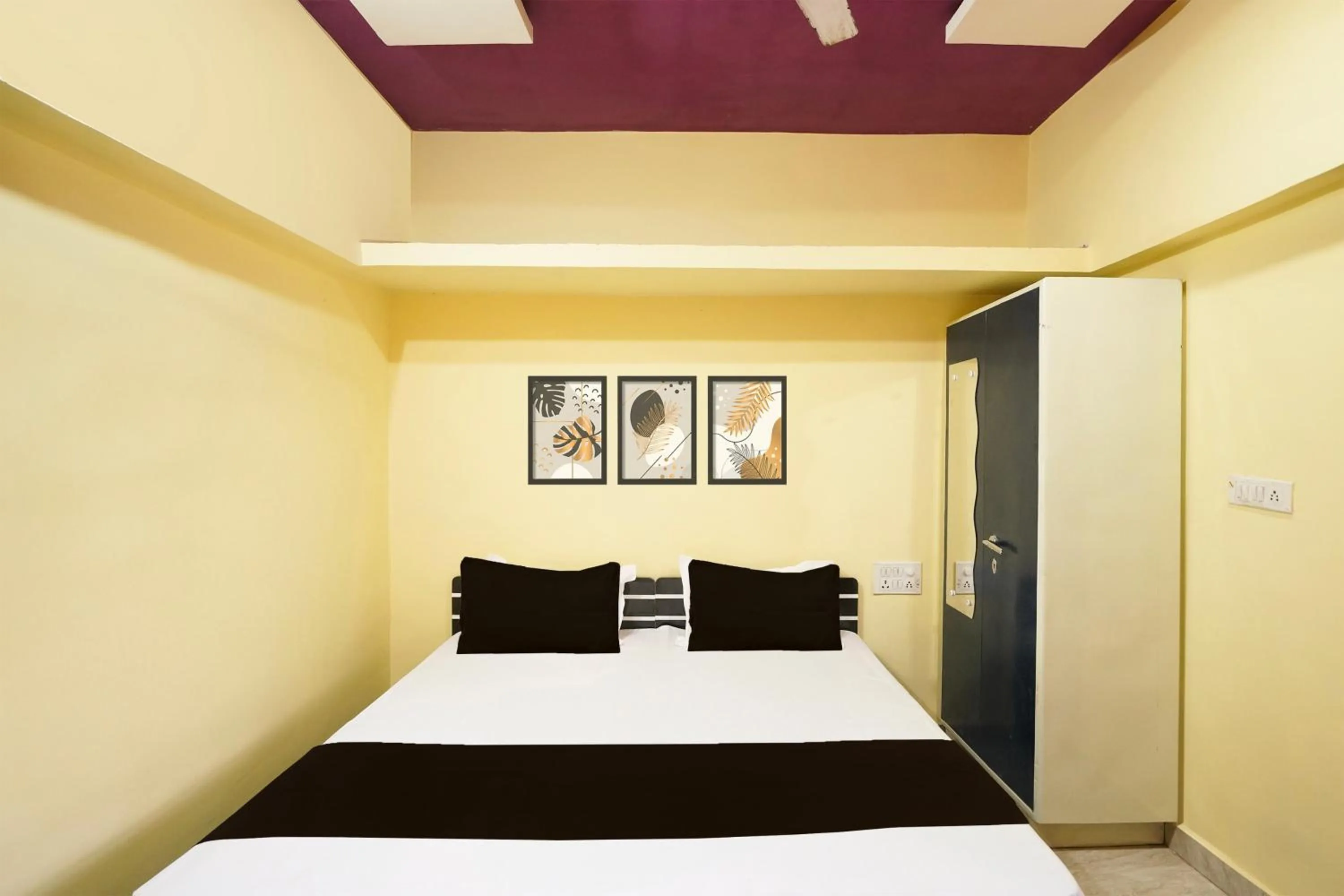 Bedroom in Hotel O Happy Hotel