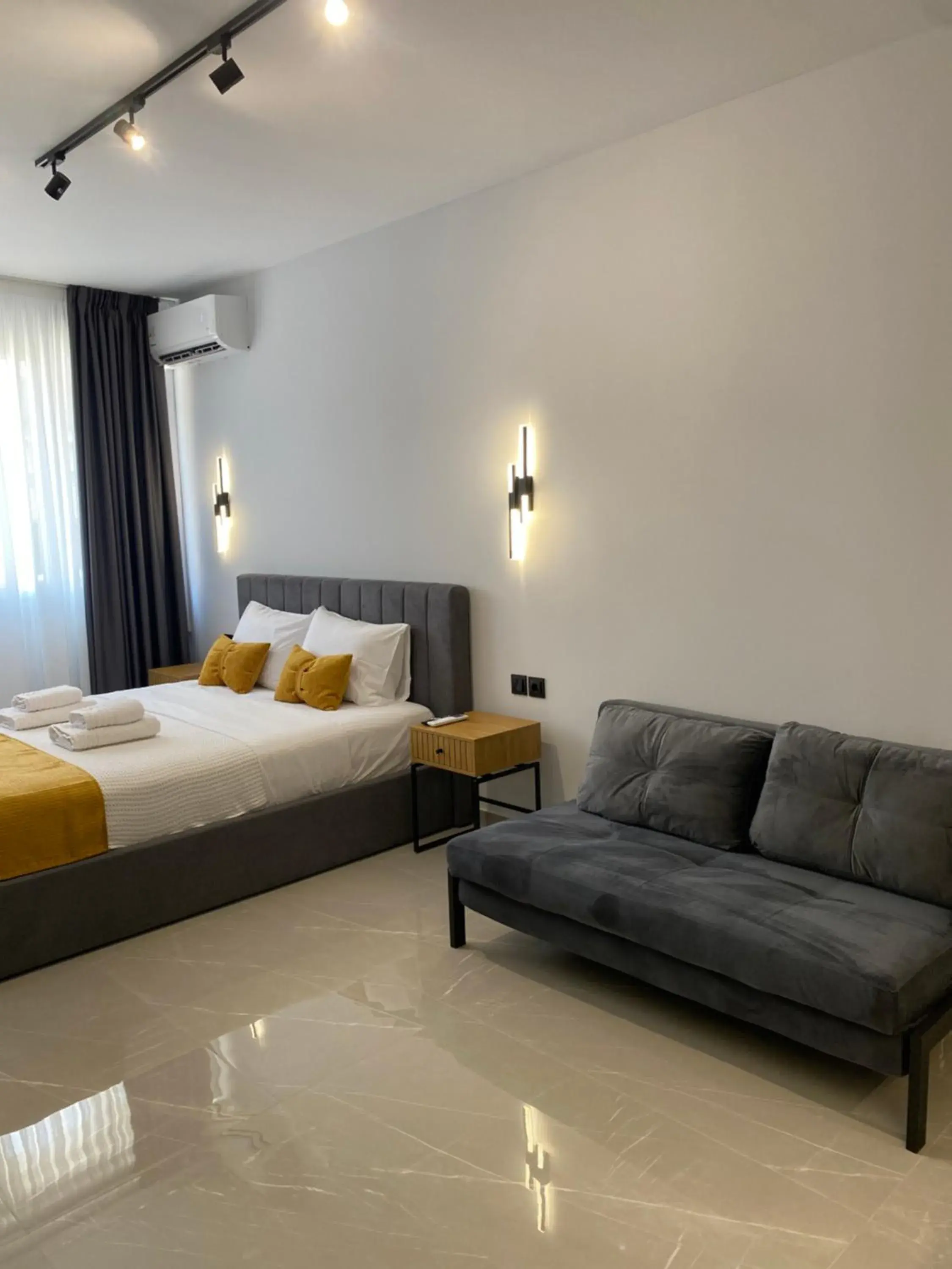 Superior Quadruple Room in Thess Living Suites Superior Quadruple Room in Thess Living Suites