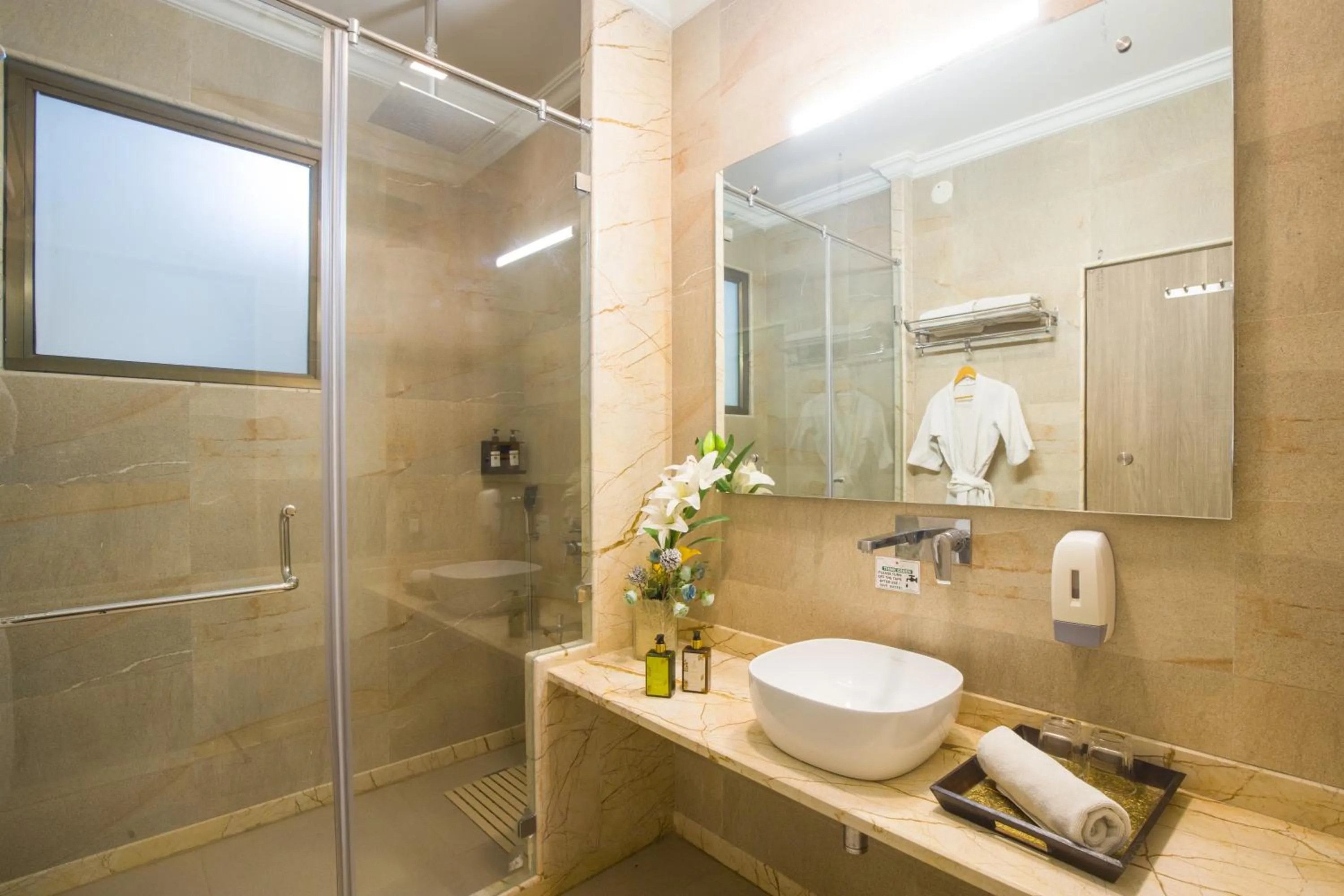 Shower in ELIVAAS Shourya Celesta Luxe 3BHK Villa with Pvt Pool, Udaipur