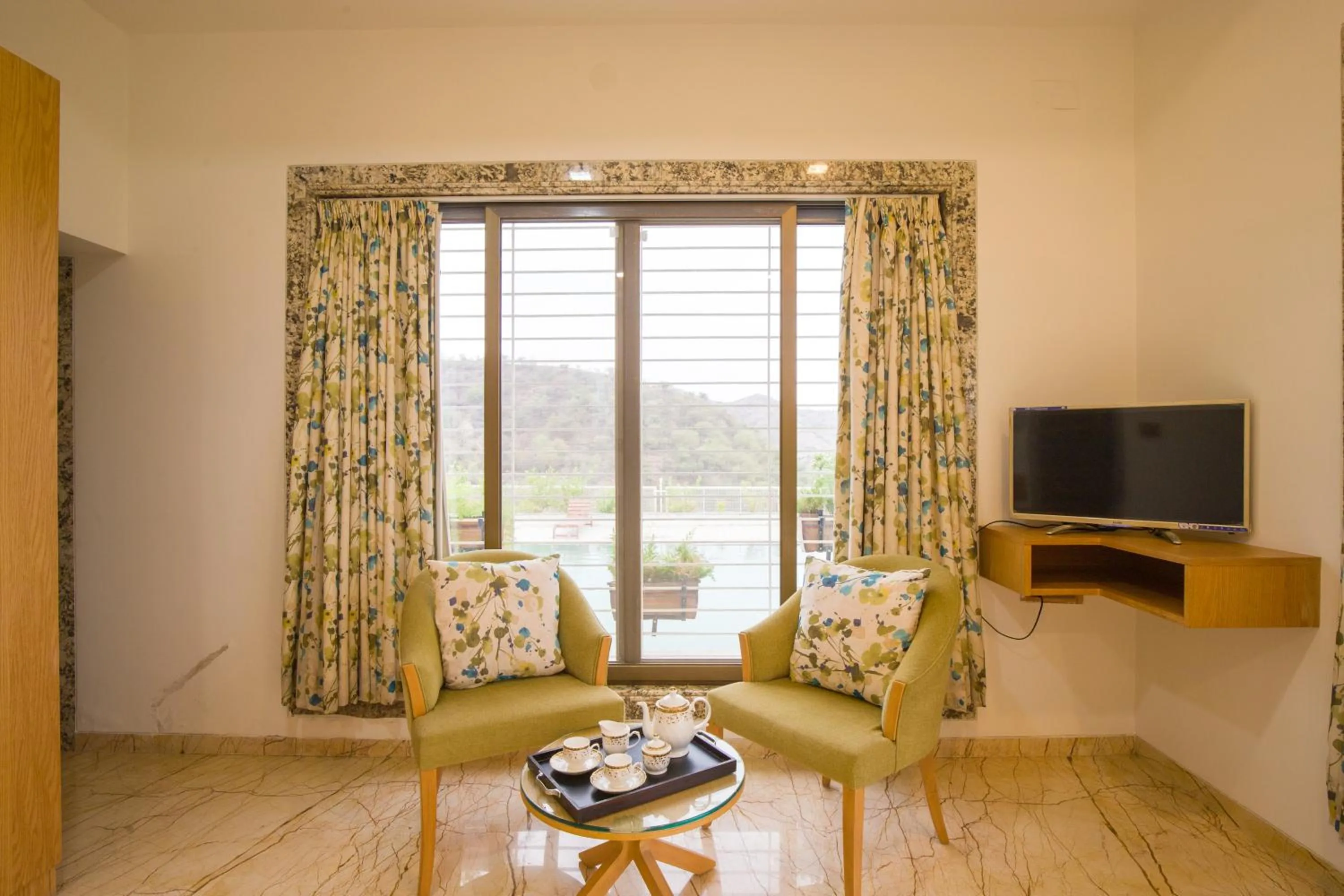 TV and multimedia in ELIVAAS Shourya Celesta Luxe 3BHK Villa with Pvt Pool, Udaipur