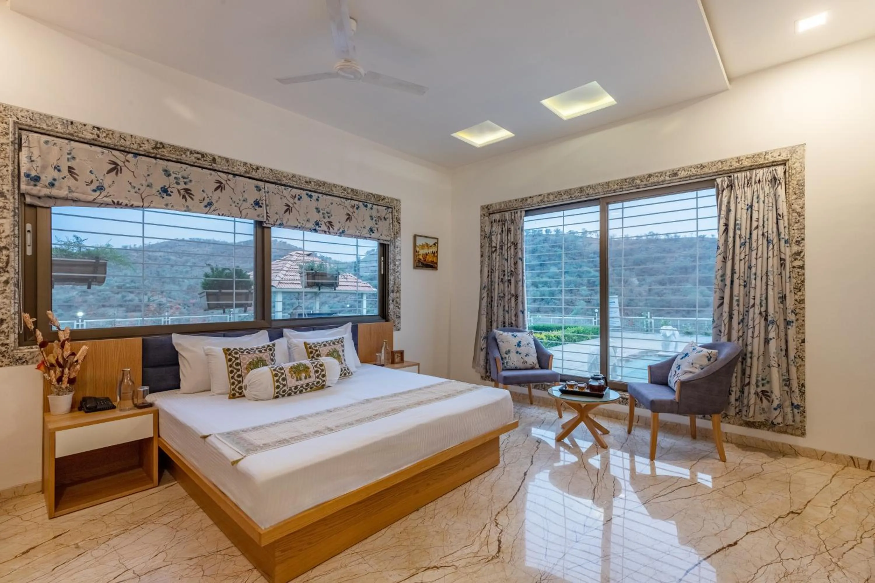Bed in ELIVAAS Shourya Celesta Luxe 3BHK Villa with Pvt Pool, Udaipur