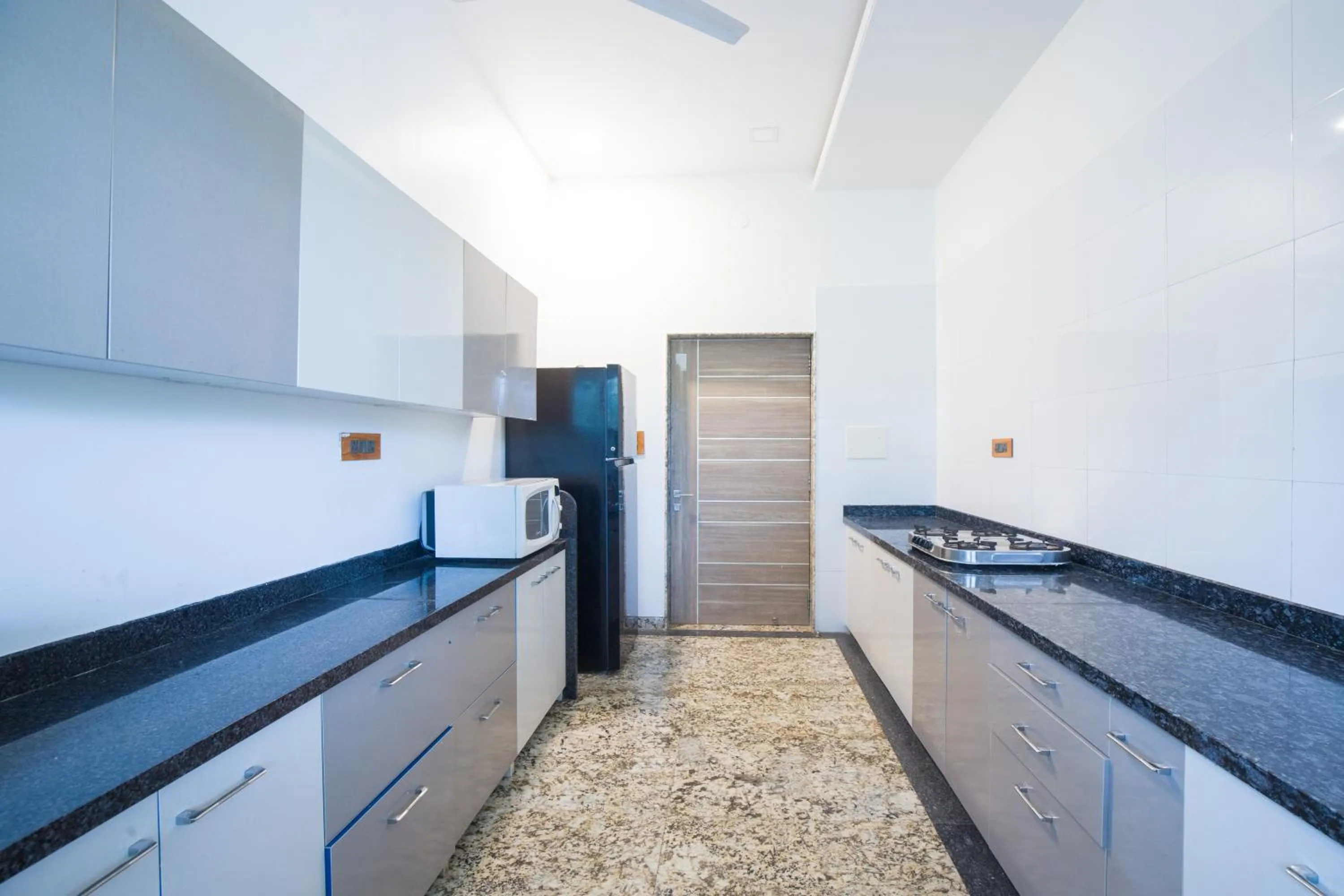 Kitchen or kitchenette in ELIVAAS Shourya Celesta Luxe 3BHK Villa with Pvt Pool, Udaipur