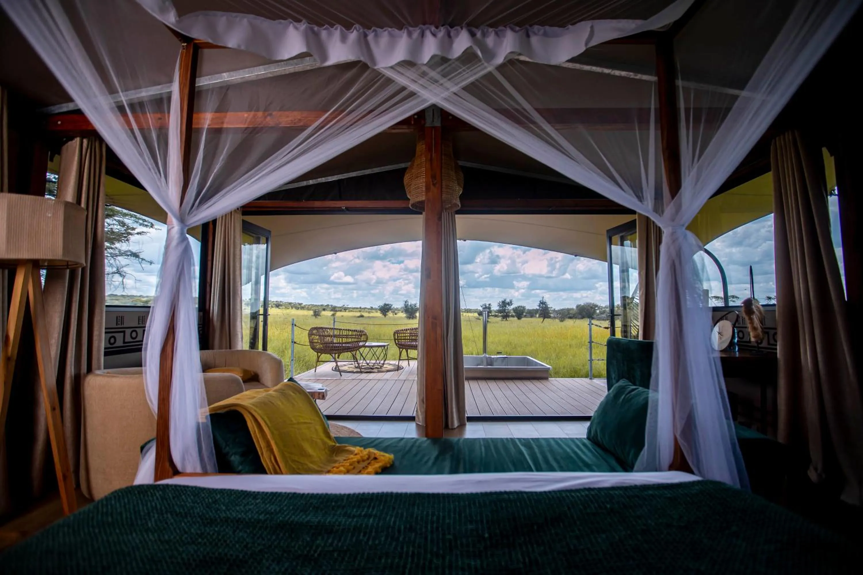 Patio, Bed in Escarpment Serengeti Luxury Camp