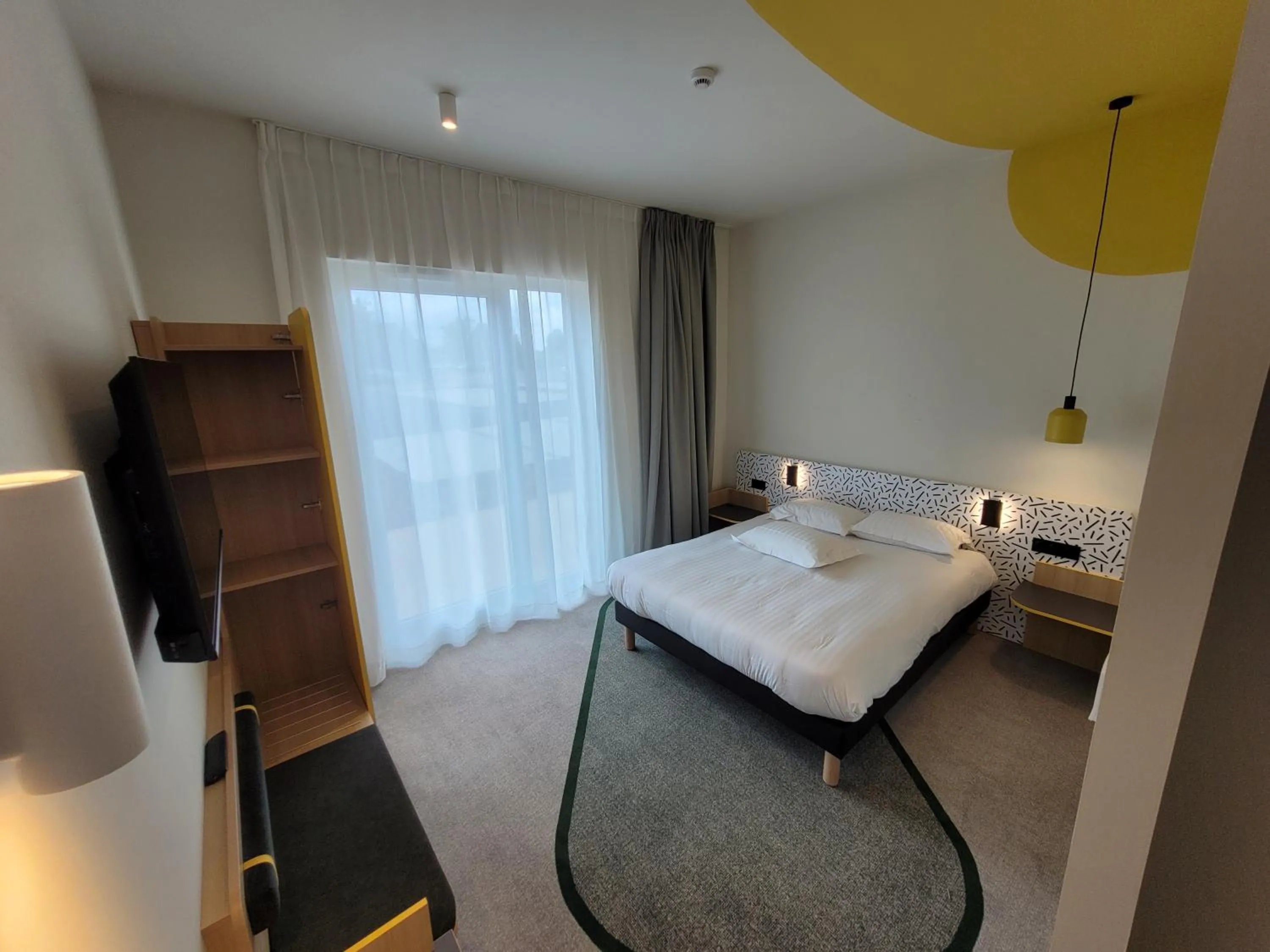 Bed in Hôtel AKENA Strasbourg - Hoerdt