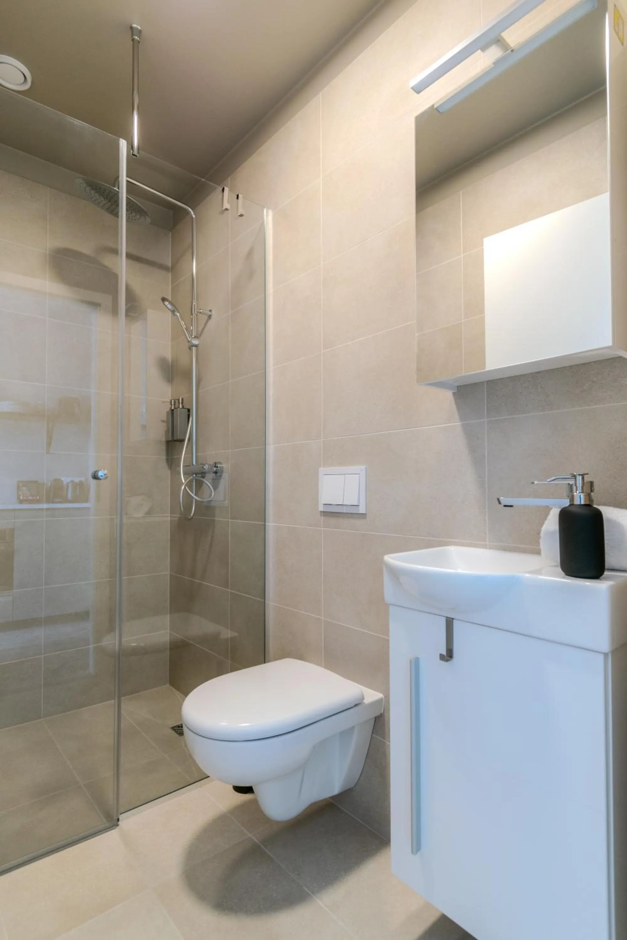 Shower in Frost Apartments by Heimaleiga