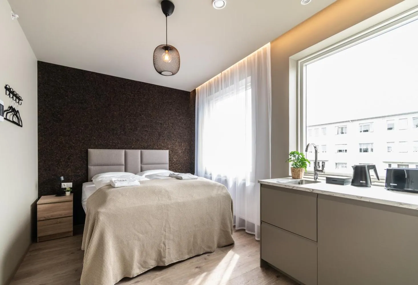 Bed in Frost Apartments by Heimaleiga