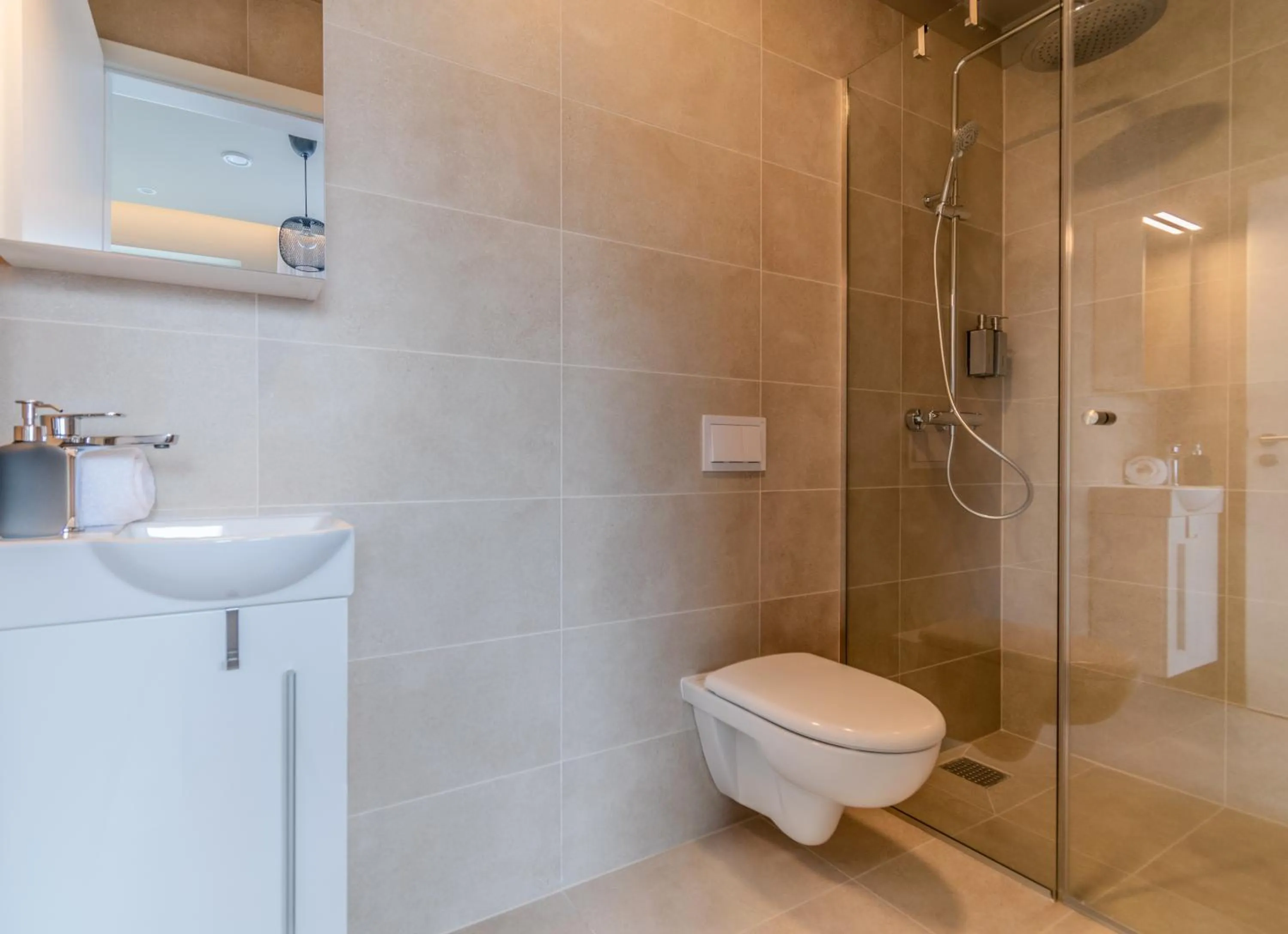 Shower in Frost Apartments by Heimaleiga