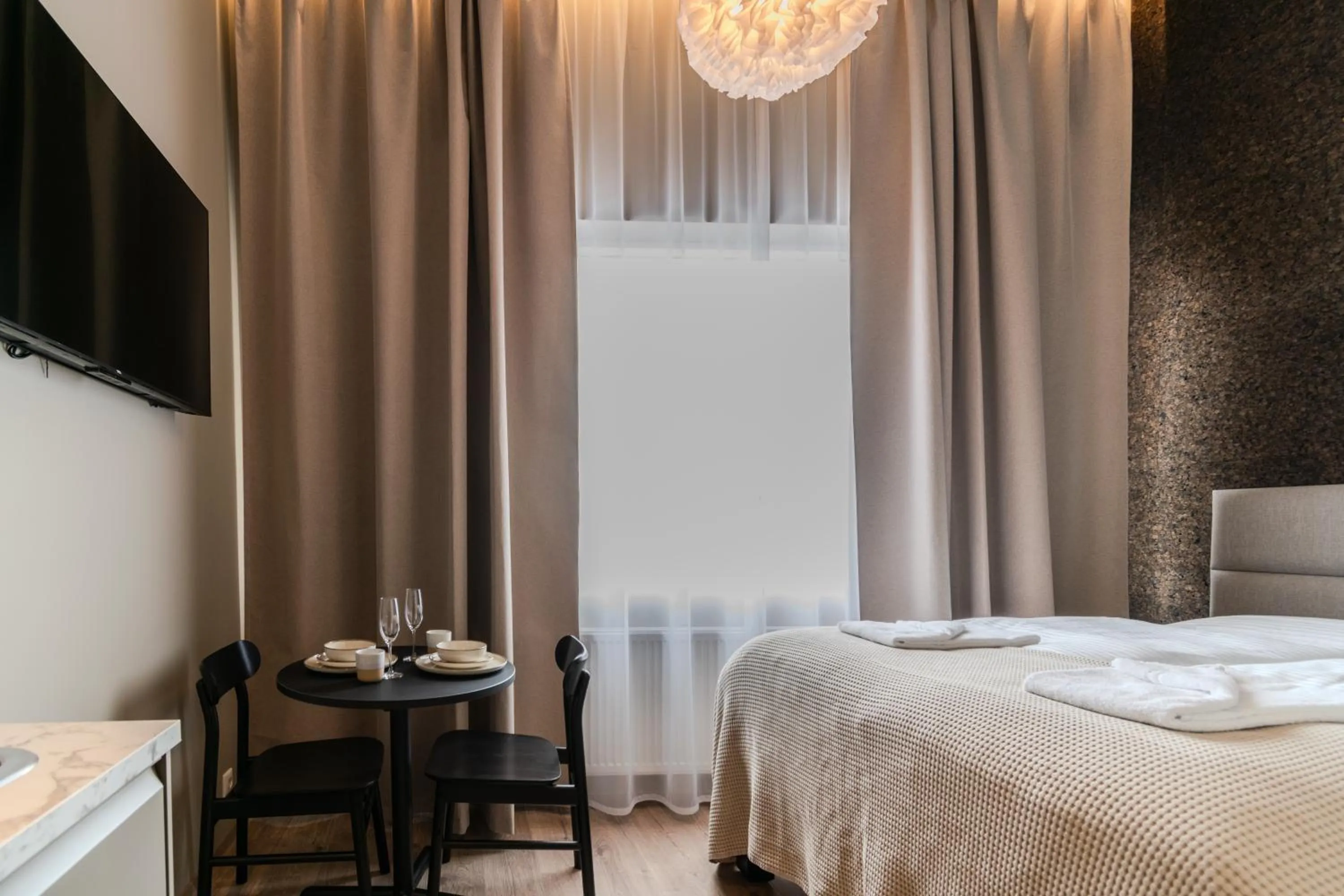 Bed in Frost Apartments by Heimaleiga