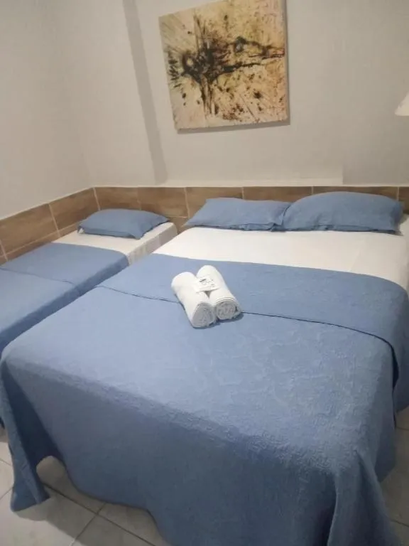 Bed in Pousada Areia da Praia