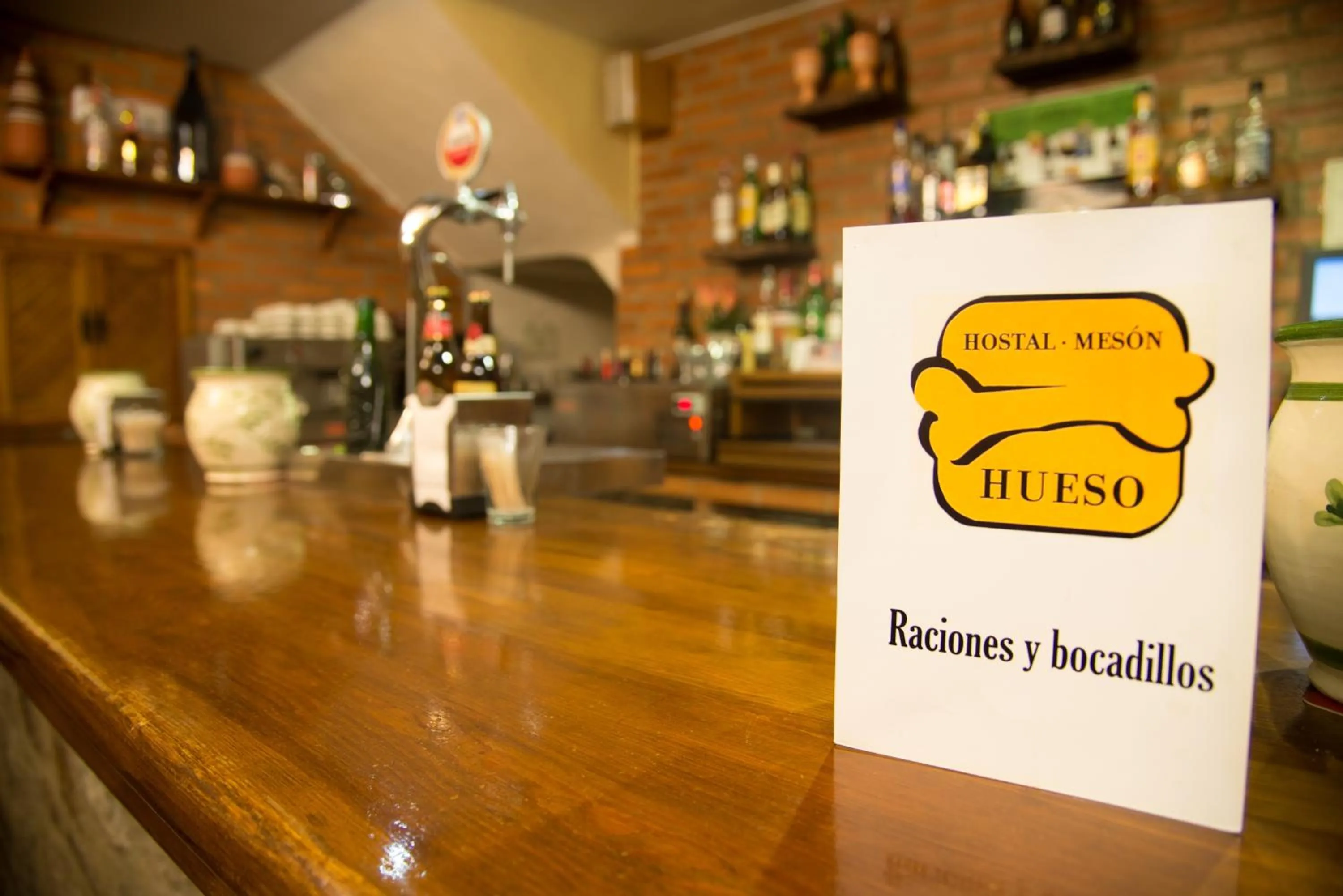 Property logo or sign in Hostal Hueso