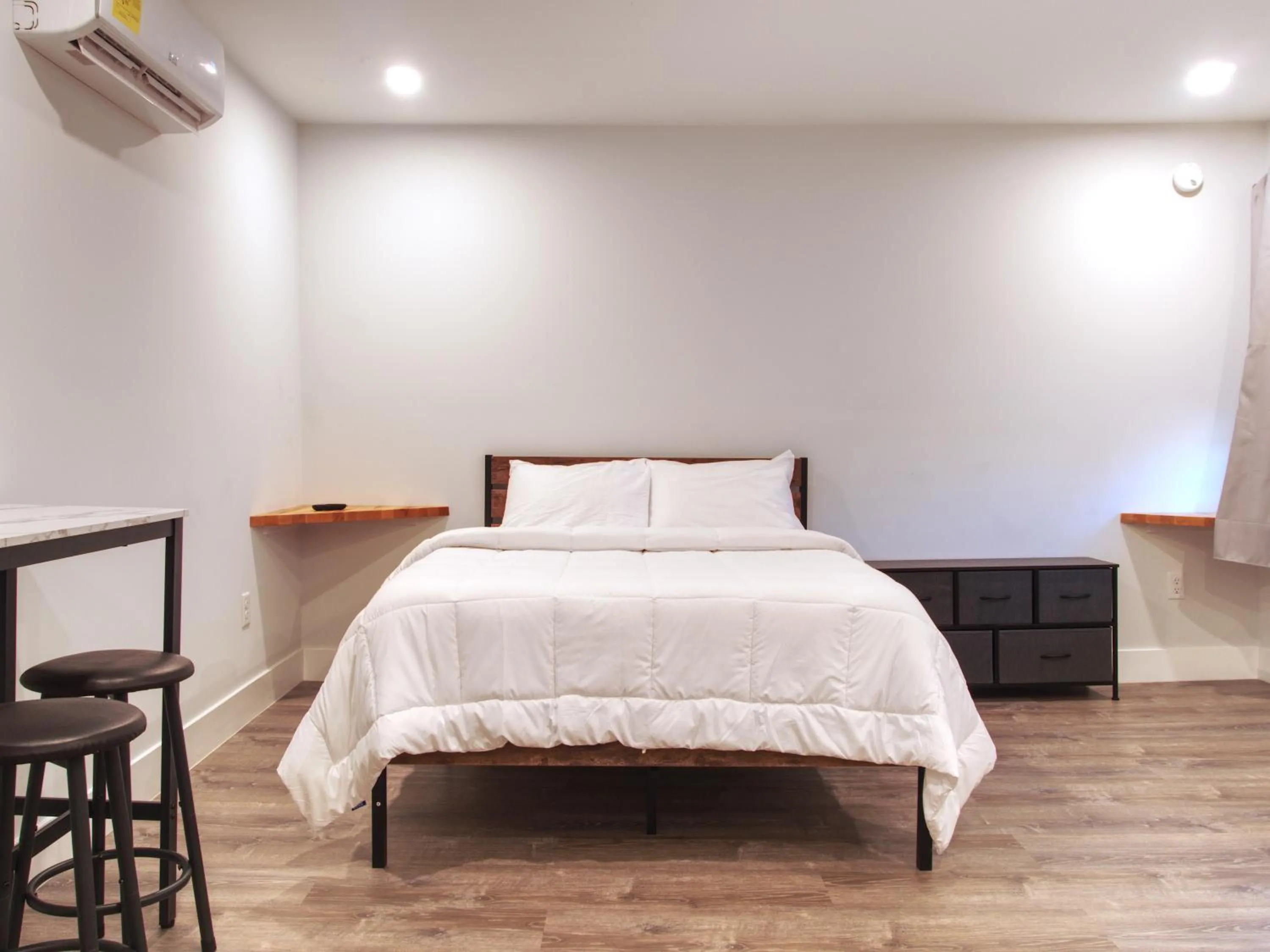 Bed in Vermont Suites