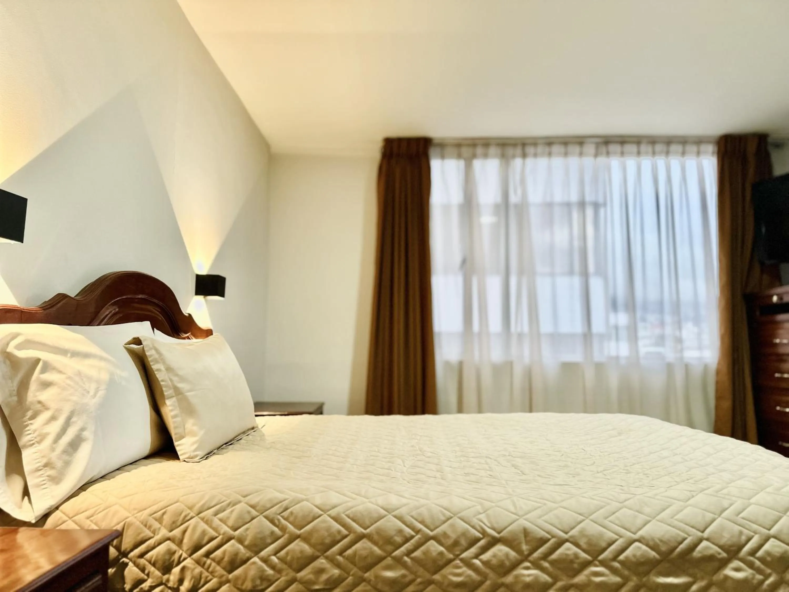 Bed in Hotel Tiwintza Internacional