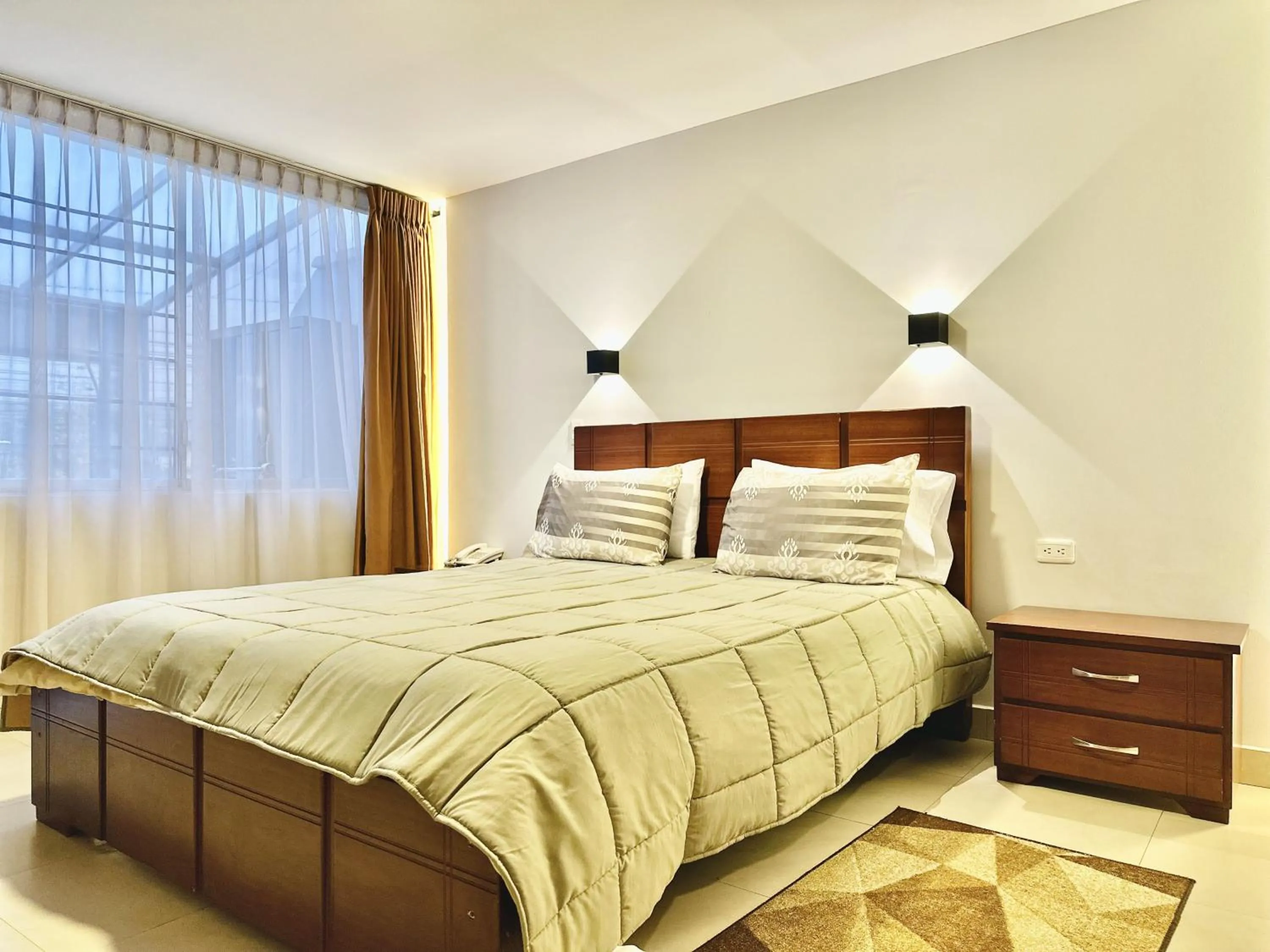 Bed in Hotel Tiwintza Internacional
