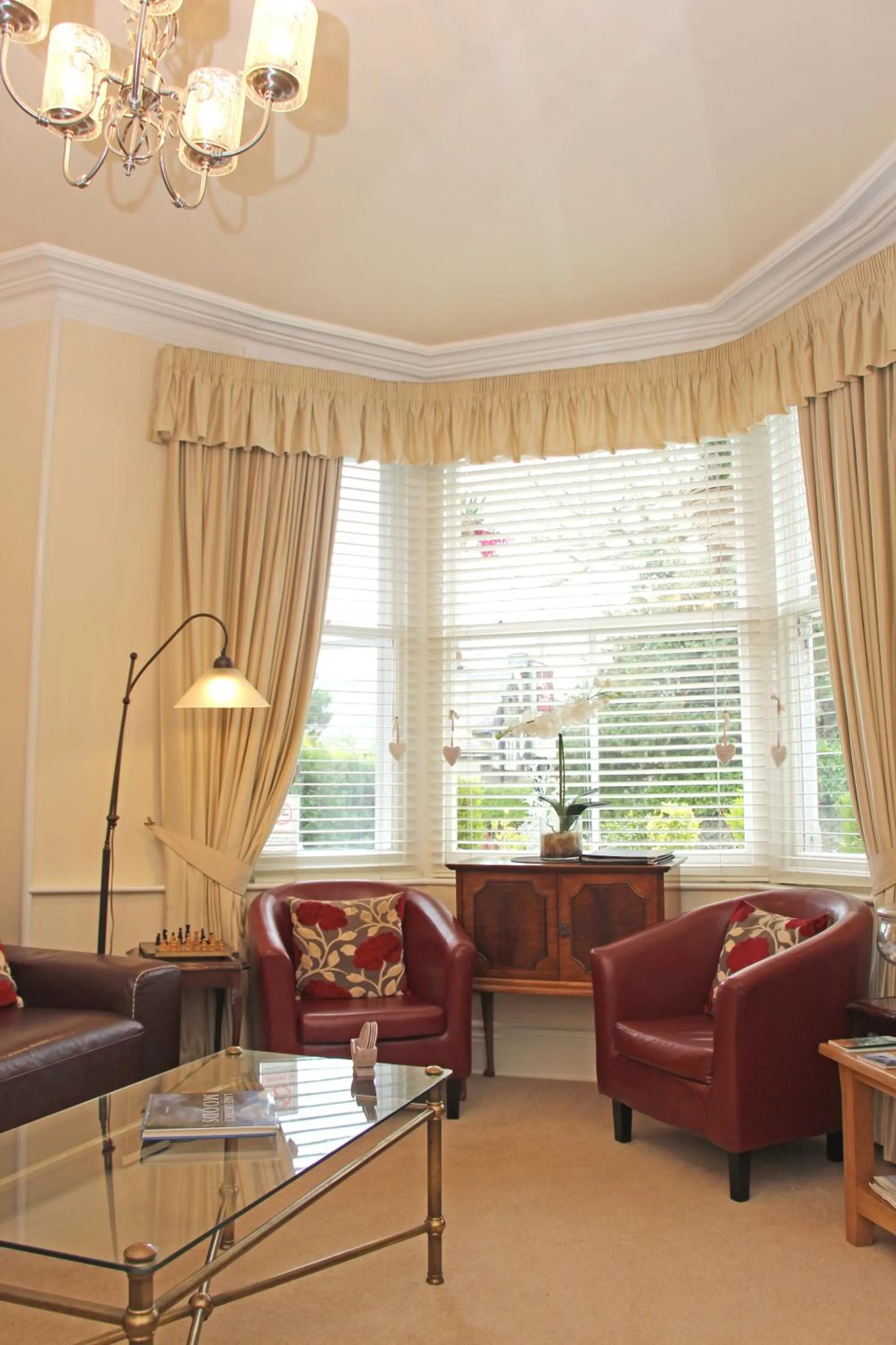 Communal lounge/ TV room in St John's Lodge Guest House incl off-site leisure club