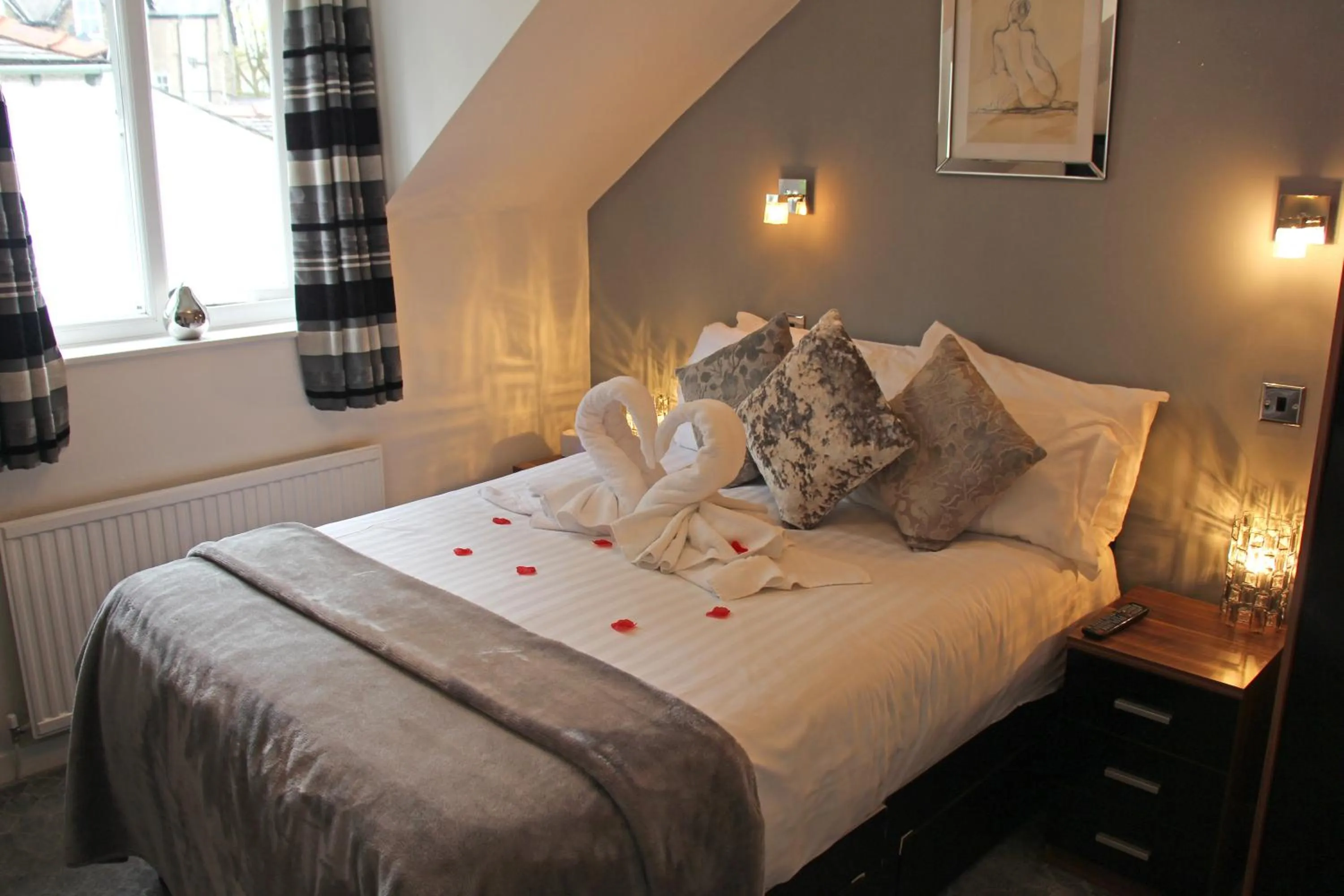 Bedroom, Bed in St John's Lodge Guest House incl off-site leisure club
