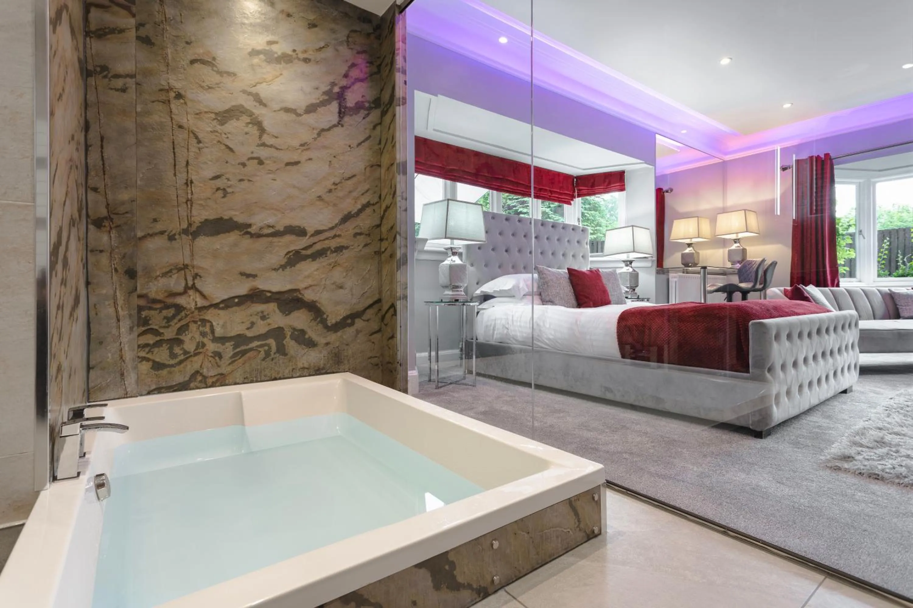 Bed in Aphrodites Group - Luxury Hot Tub Suites in Central Lake District!