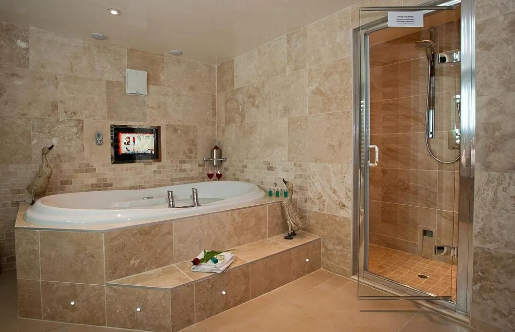 Bathroom in Aphrodites Group - Luxury Hot Tub Suites in Central Lake District!