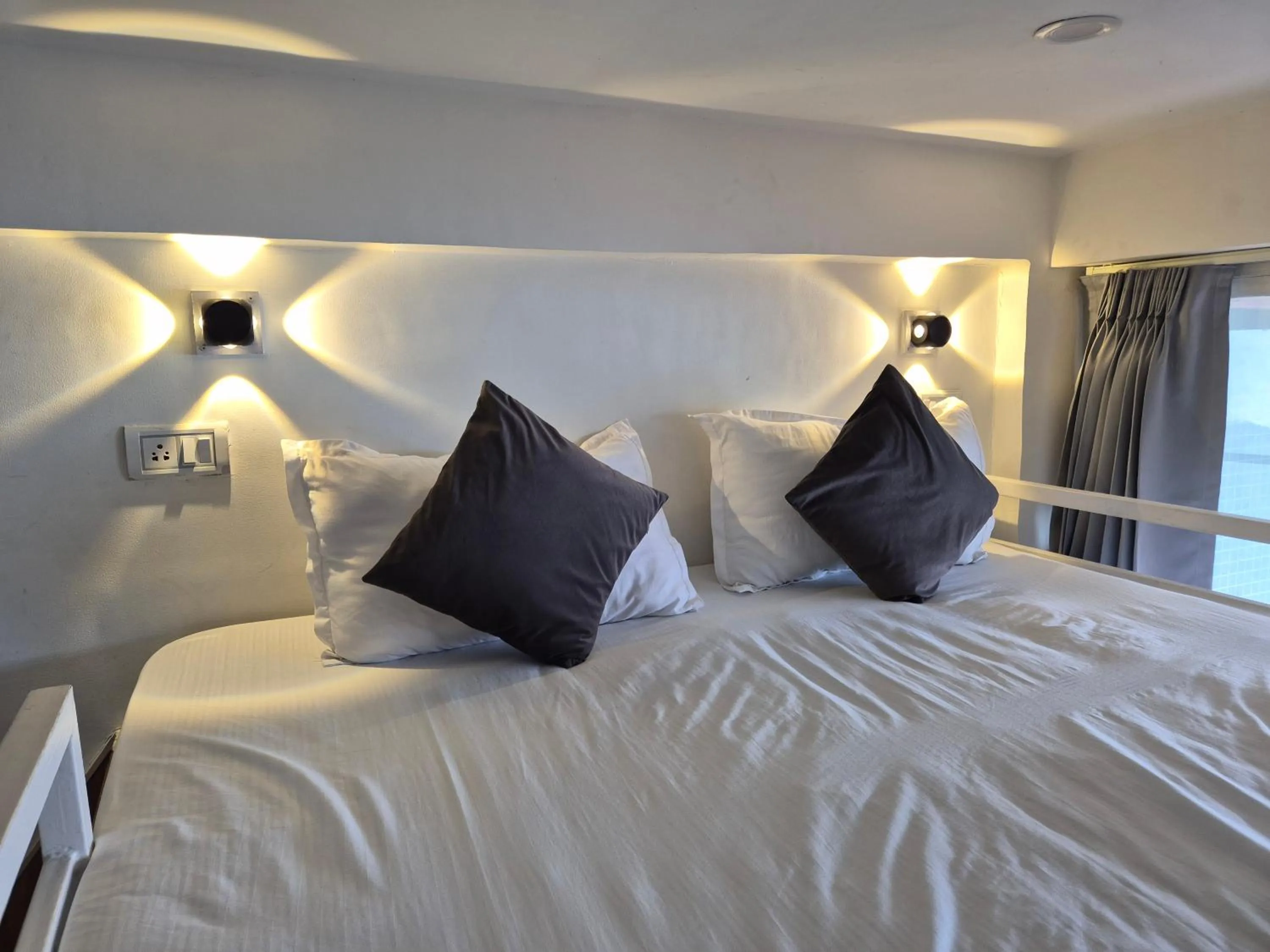 Bed in The Coverpage Boutique Stays Mussoorie