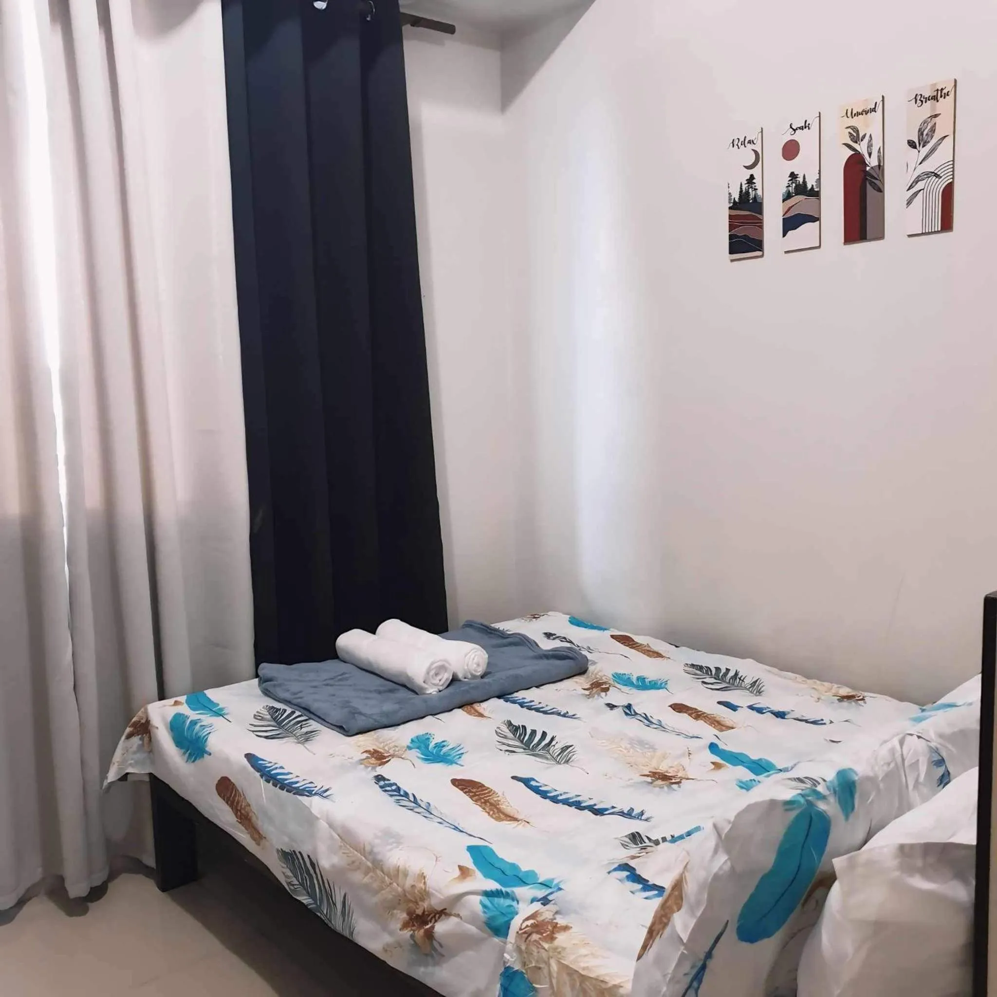 Bed in Sea Residences MOA Bella Staycation