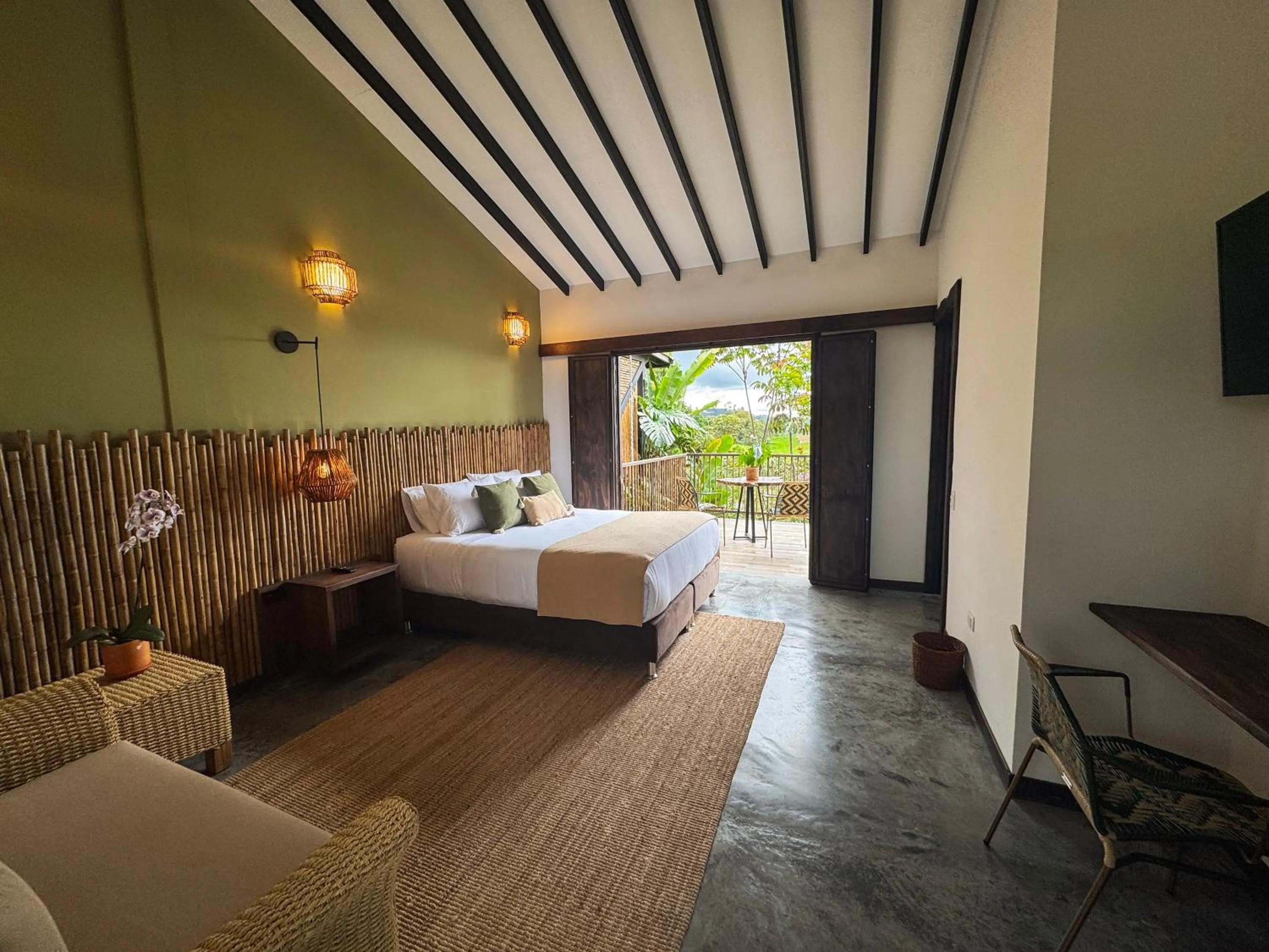 Photo of the whole room, Bed in Tukki Ecolodge Hotel