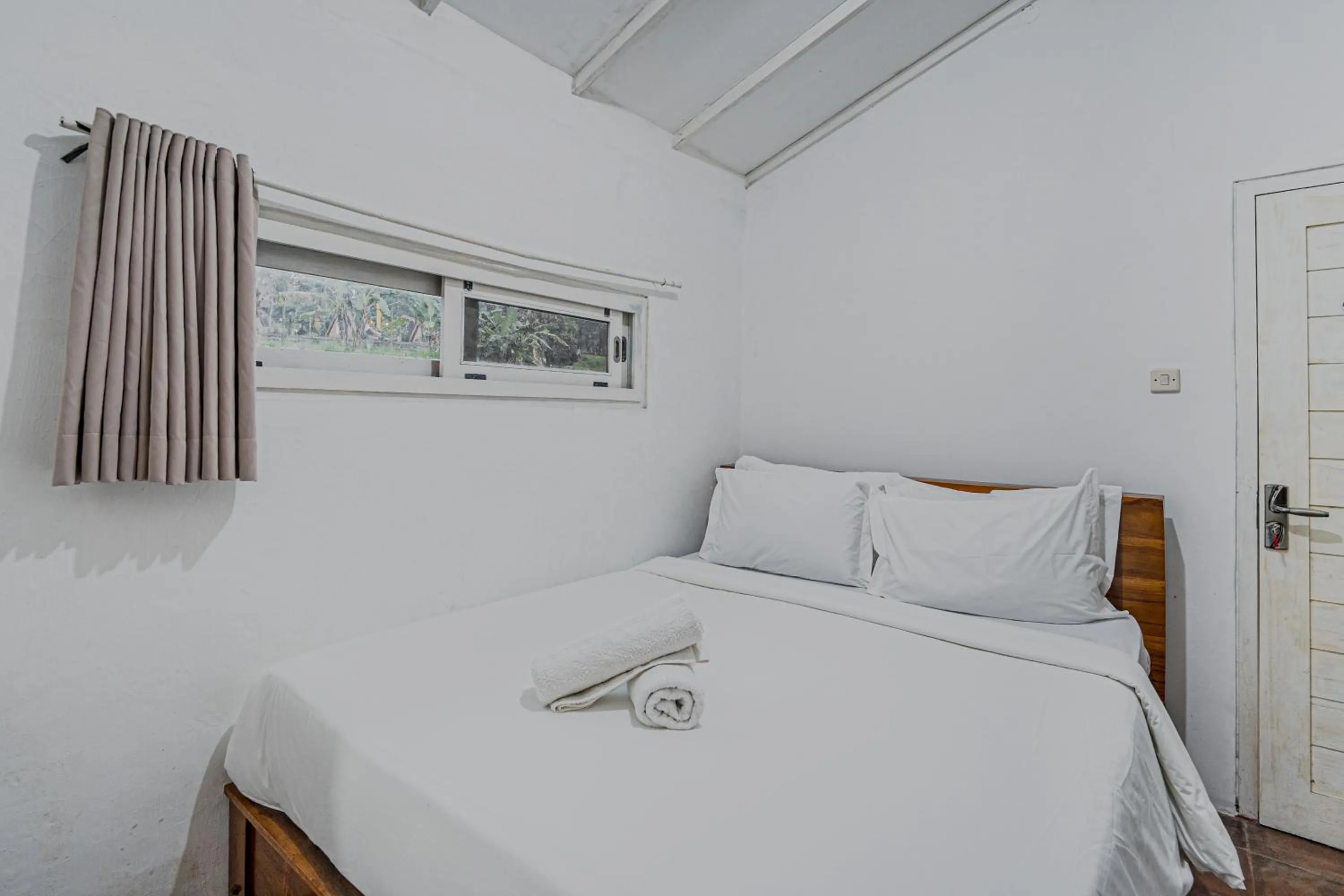 Bed in Jatiluwih Santya Loka Lodge & Twin Waterfall Managed by Manara