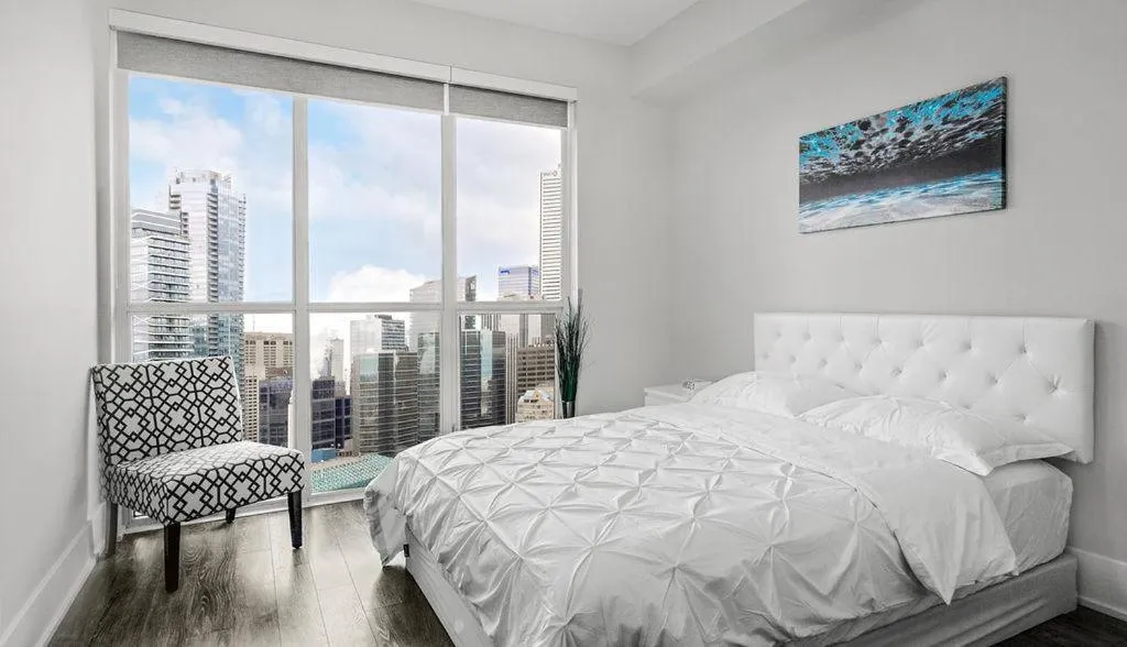 Bedroom, Bed in Skyline Suites - Walk to MTCC, ACC, Rogers Centre & Entertainment District