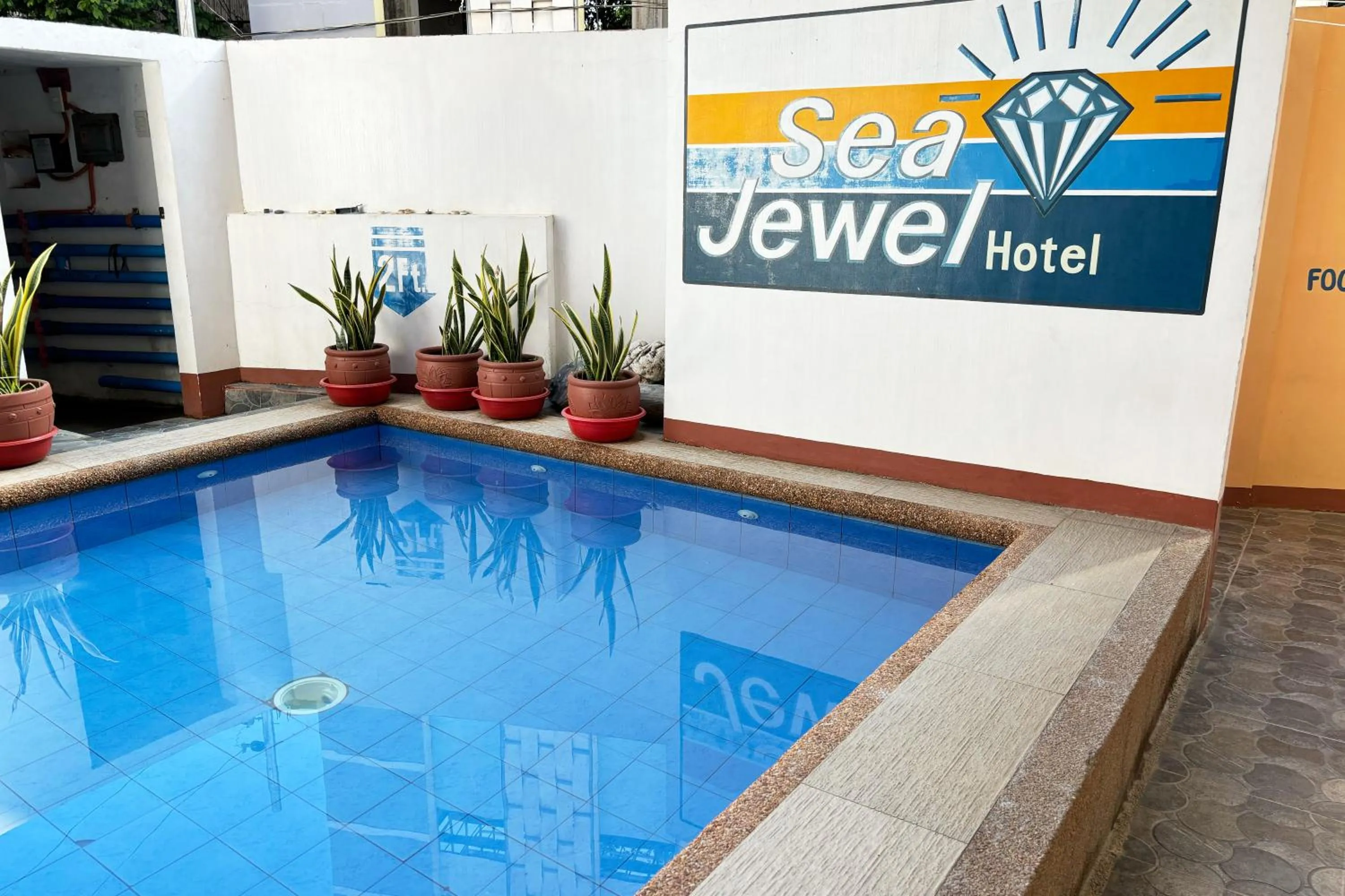 Swimming pool in Sea Jewel Hotel Puerto Galera powered by Cocotel