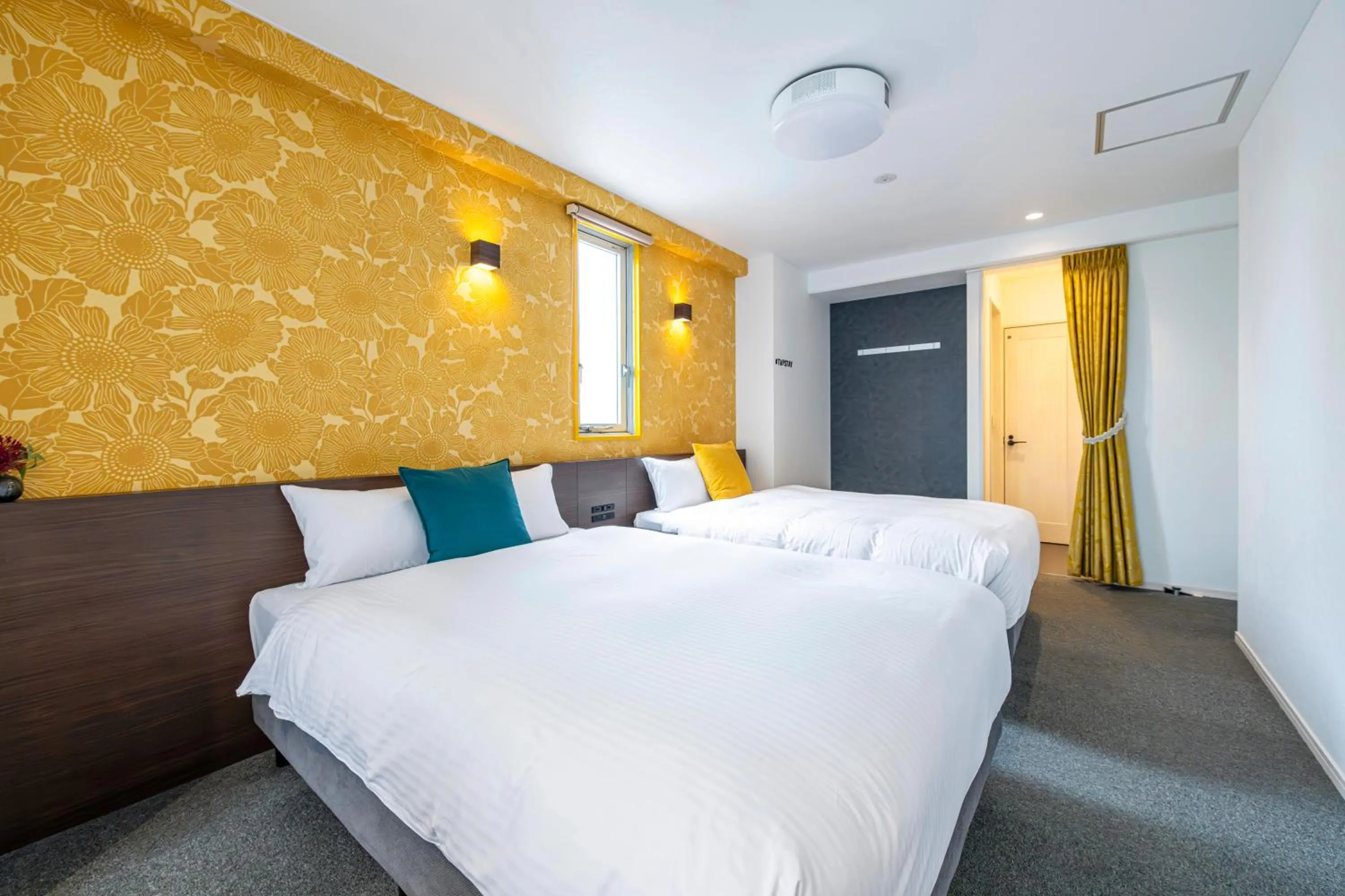 Bed in TapStay Hotel