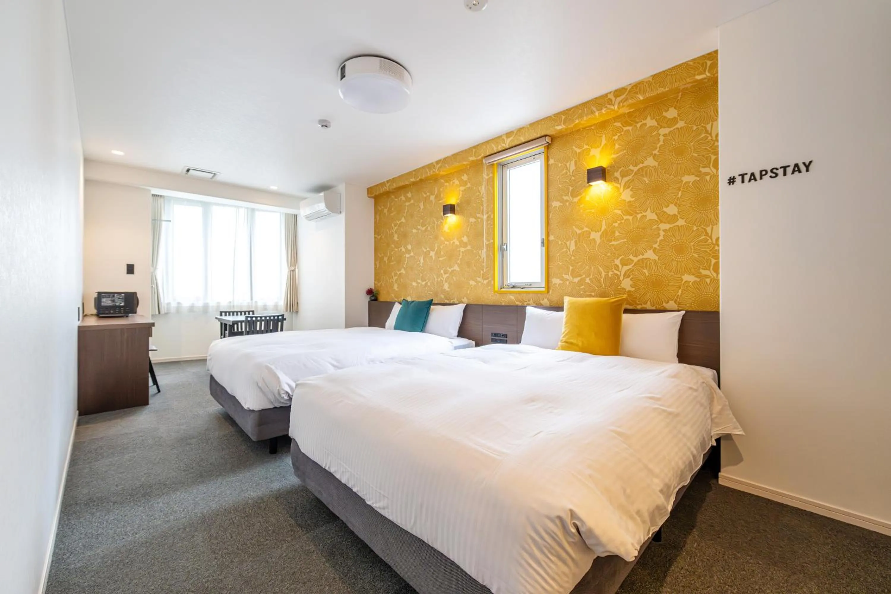 Bed in TapStay Hotel