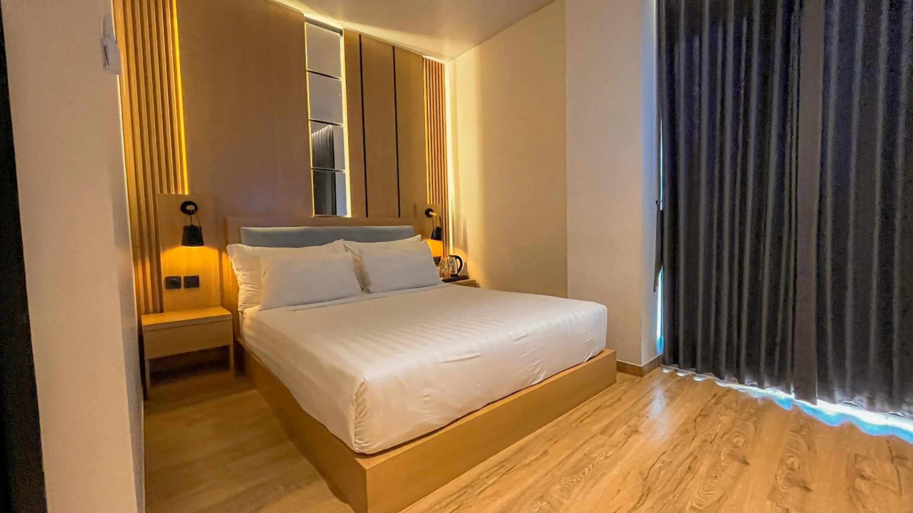 Bed in Eagle Hotel Wonosobo, Azana Hotels Collection