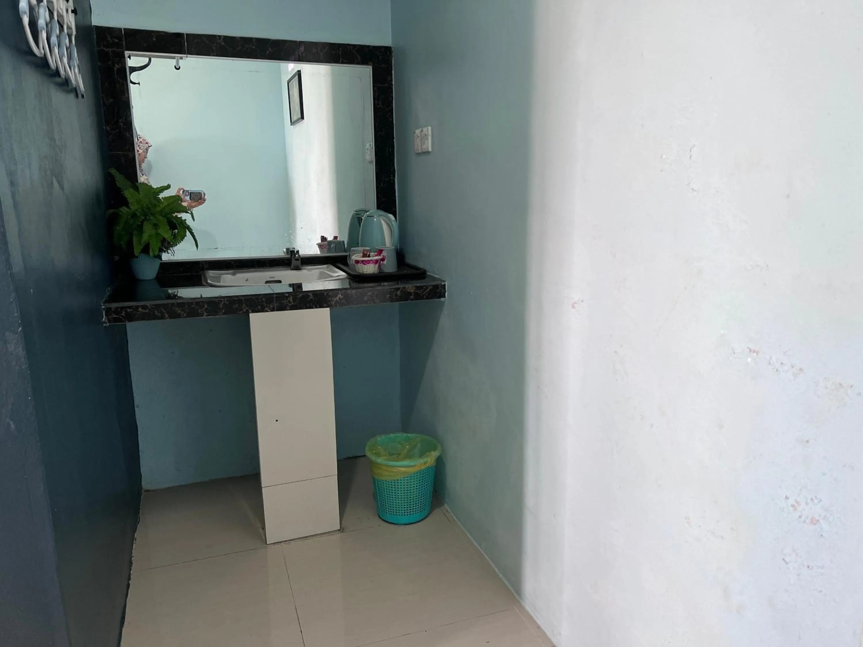 Bathroom in Capital O 91017 Tuba Beach Resort @ Pulau Tuba