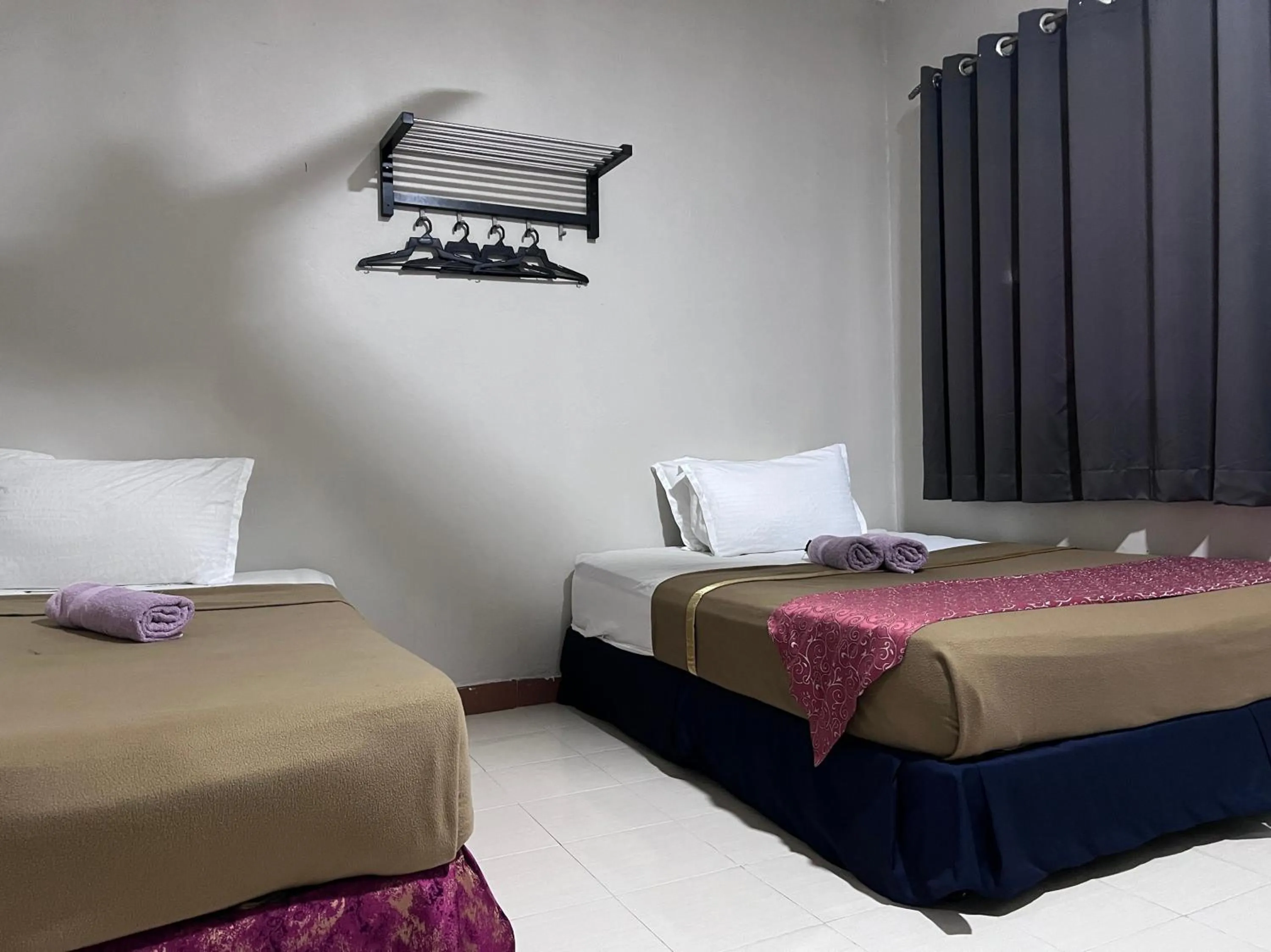 Bedroom, Bed in Capital O 91017 Tuba Beach Resort @ Pulau Tuba